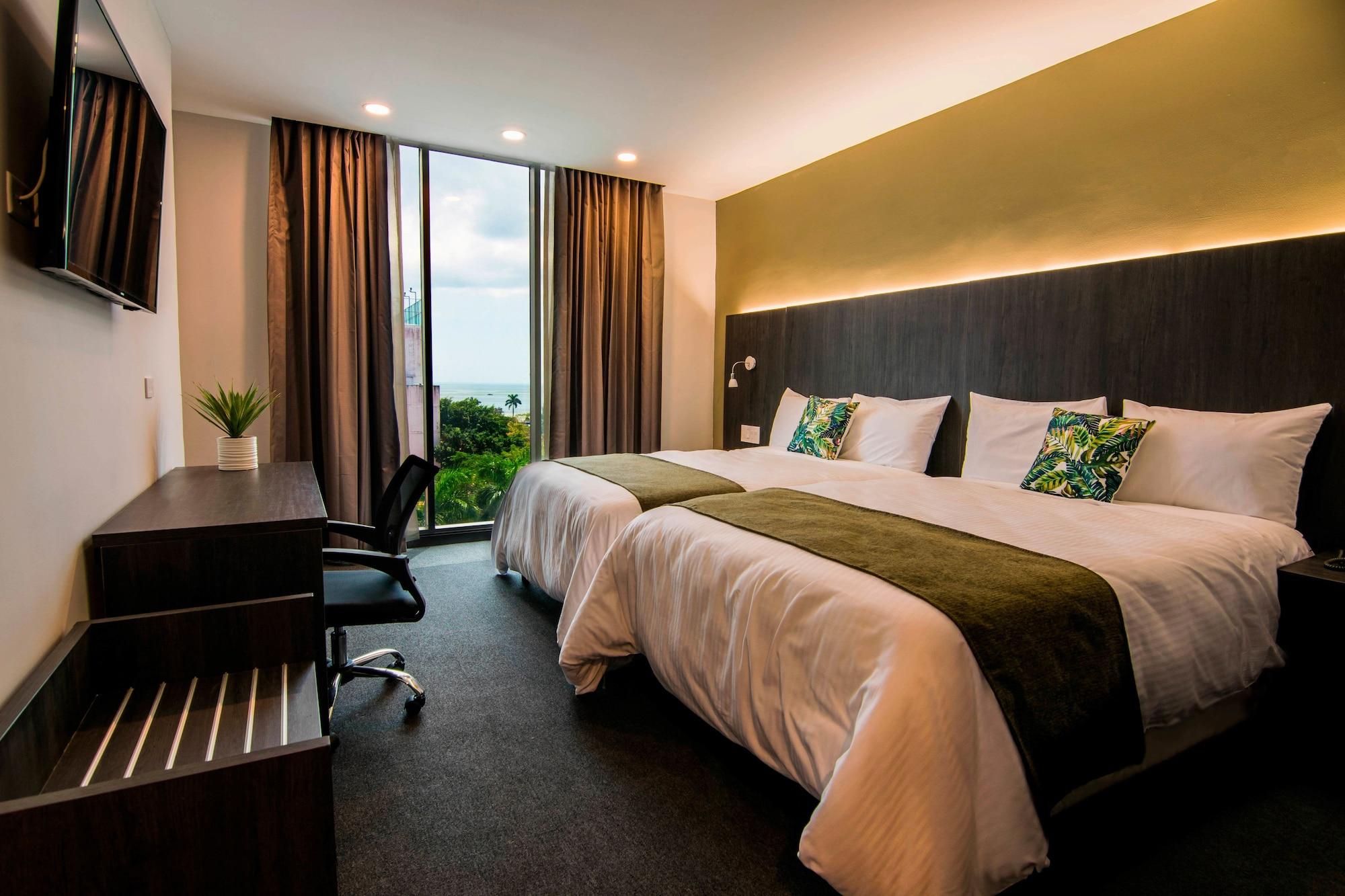 Habitación Innfiniti Hotel & Suites