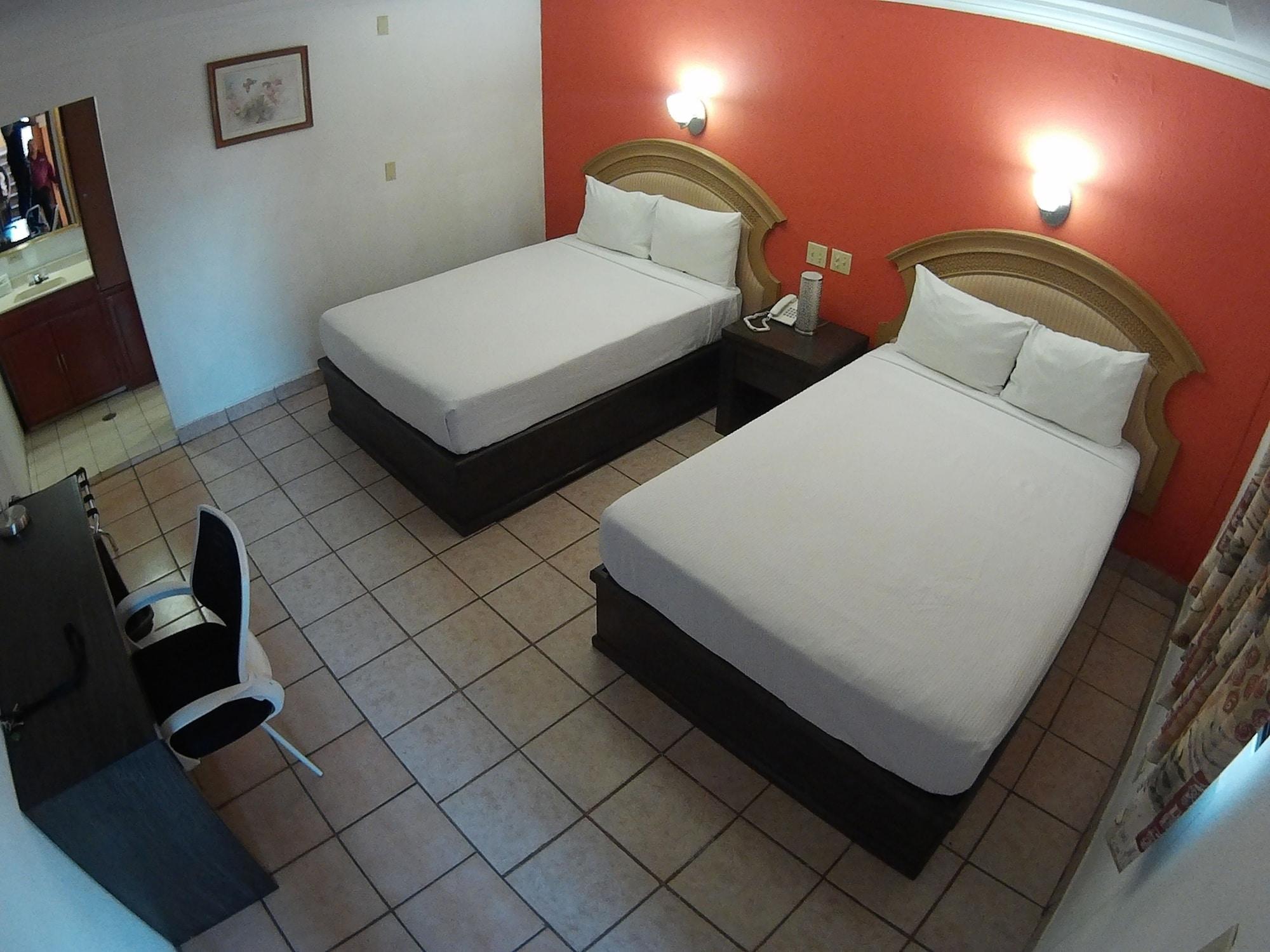 Habitación HotelCo Inn