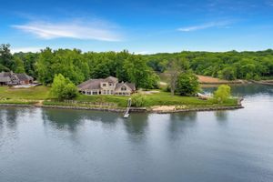 Alquiler Vacacional - Stunning waterfront villa with indoor pool and kids swing set and play area.