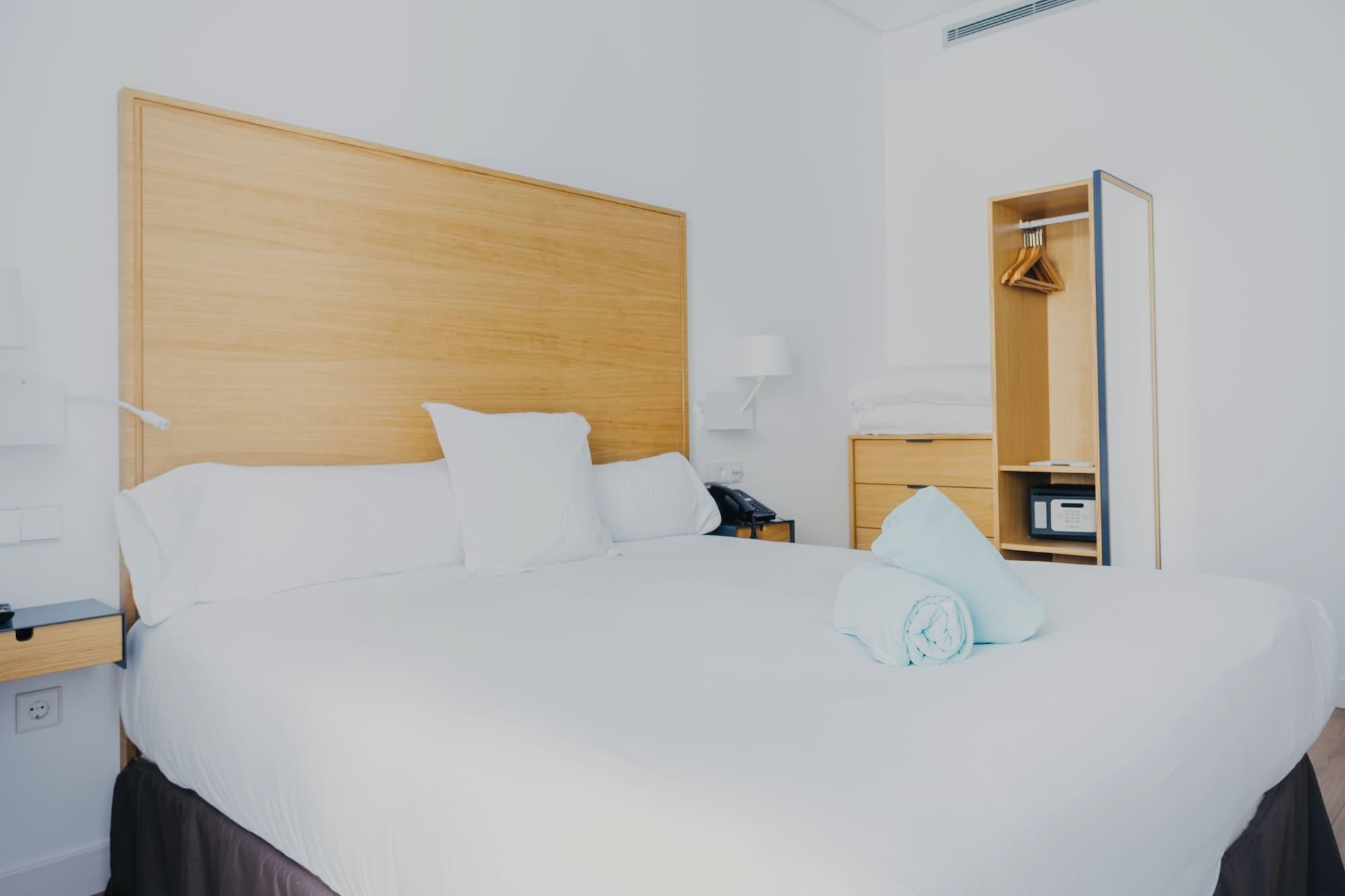 Habitación Aquitania Home Suites