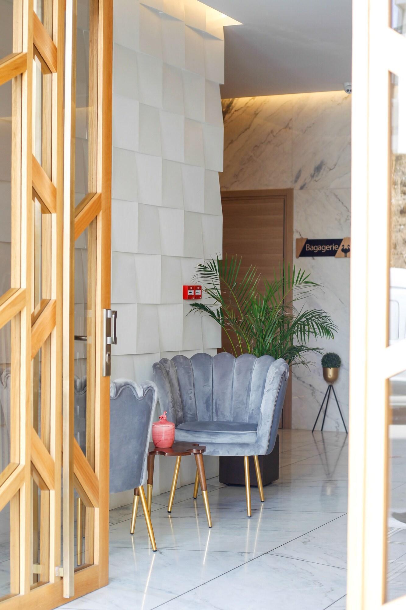 Vista Lobby Flamant Rose Appart Hôtel