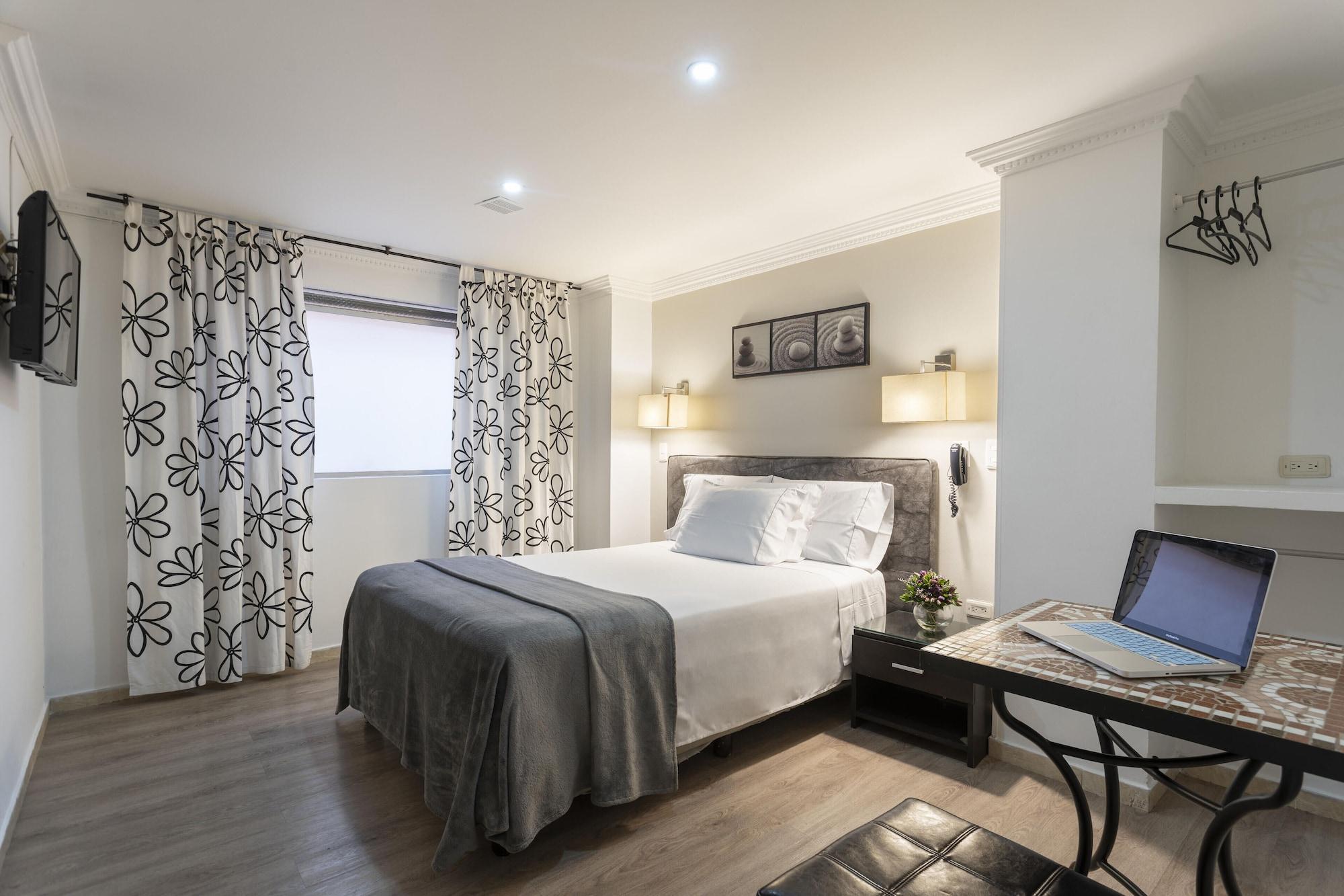 Habitación Hotel Picasso Inn