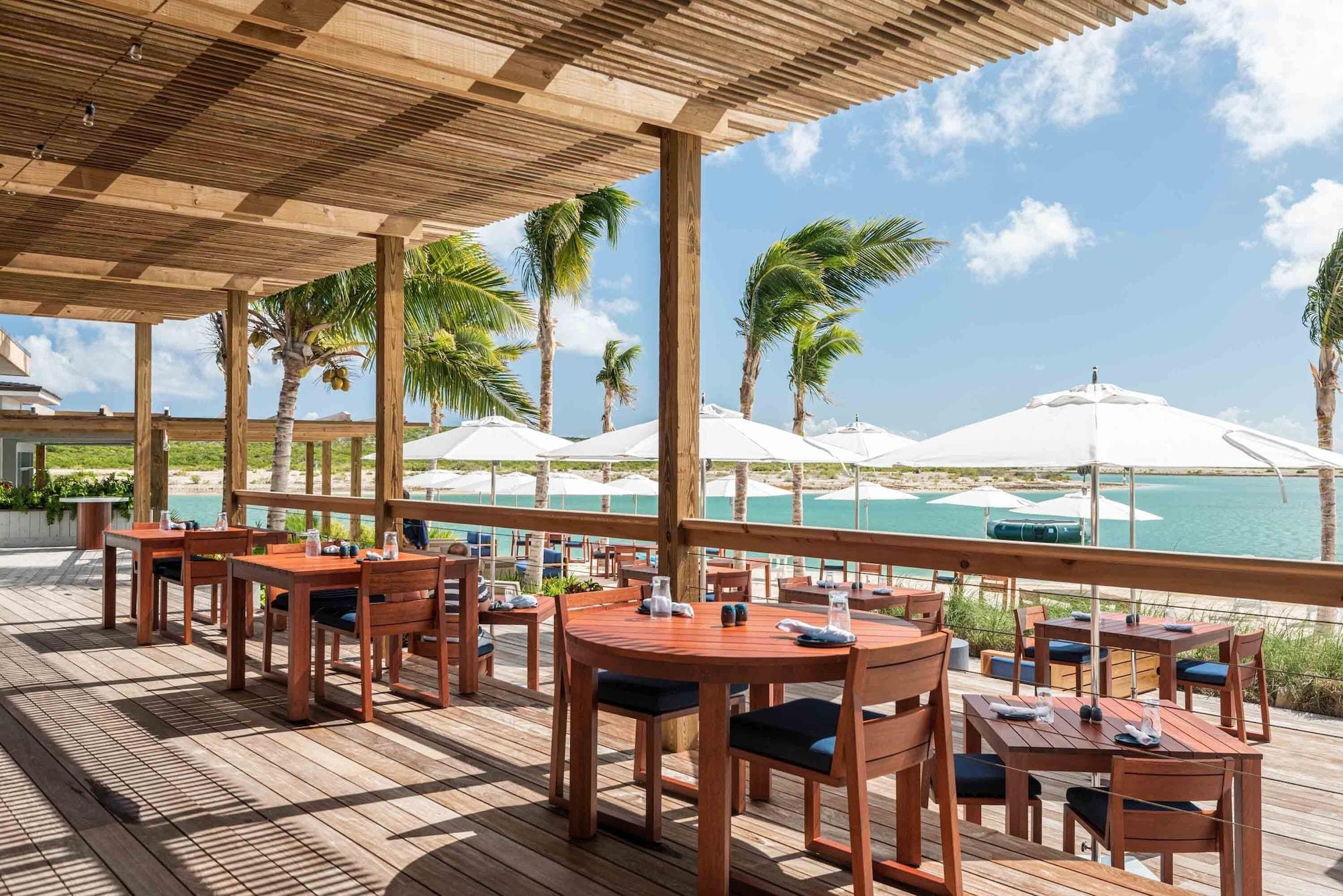 Restaurant Ambergris Cay Private Island – All Inclusive – PLS Island Hopper Flight Included