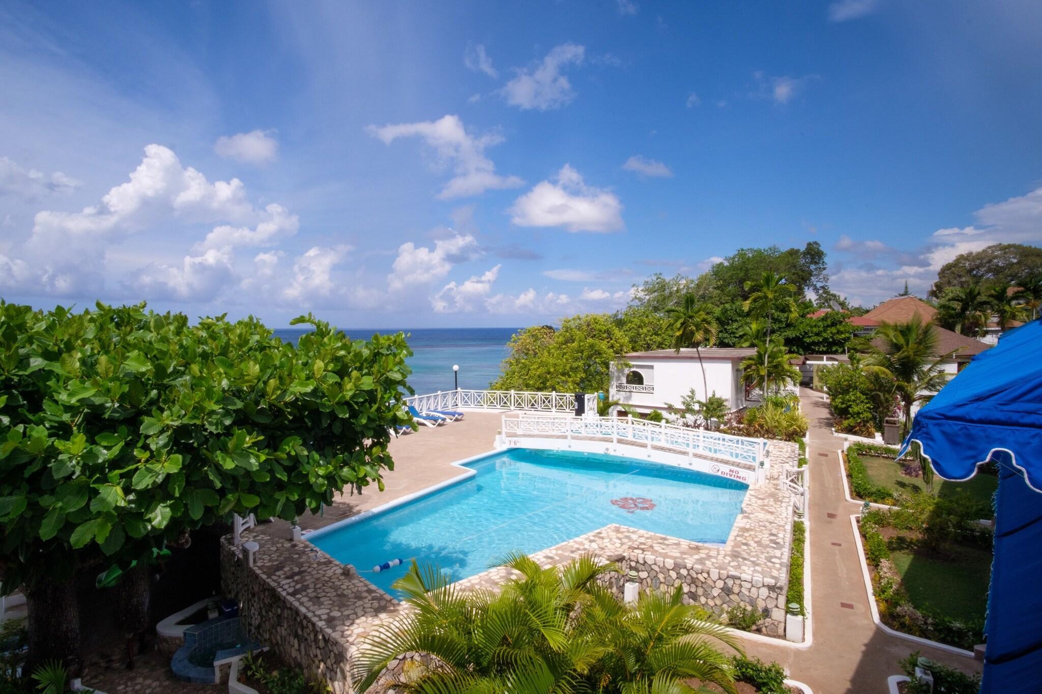 Vista Piscina Hibiscus Lodge