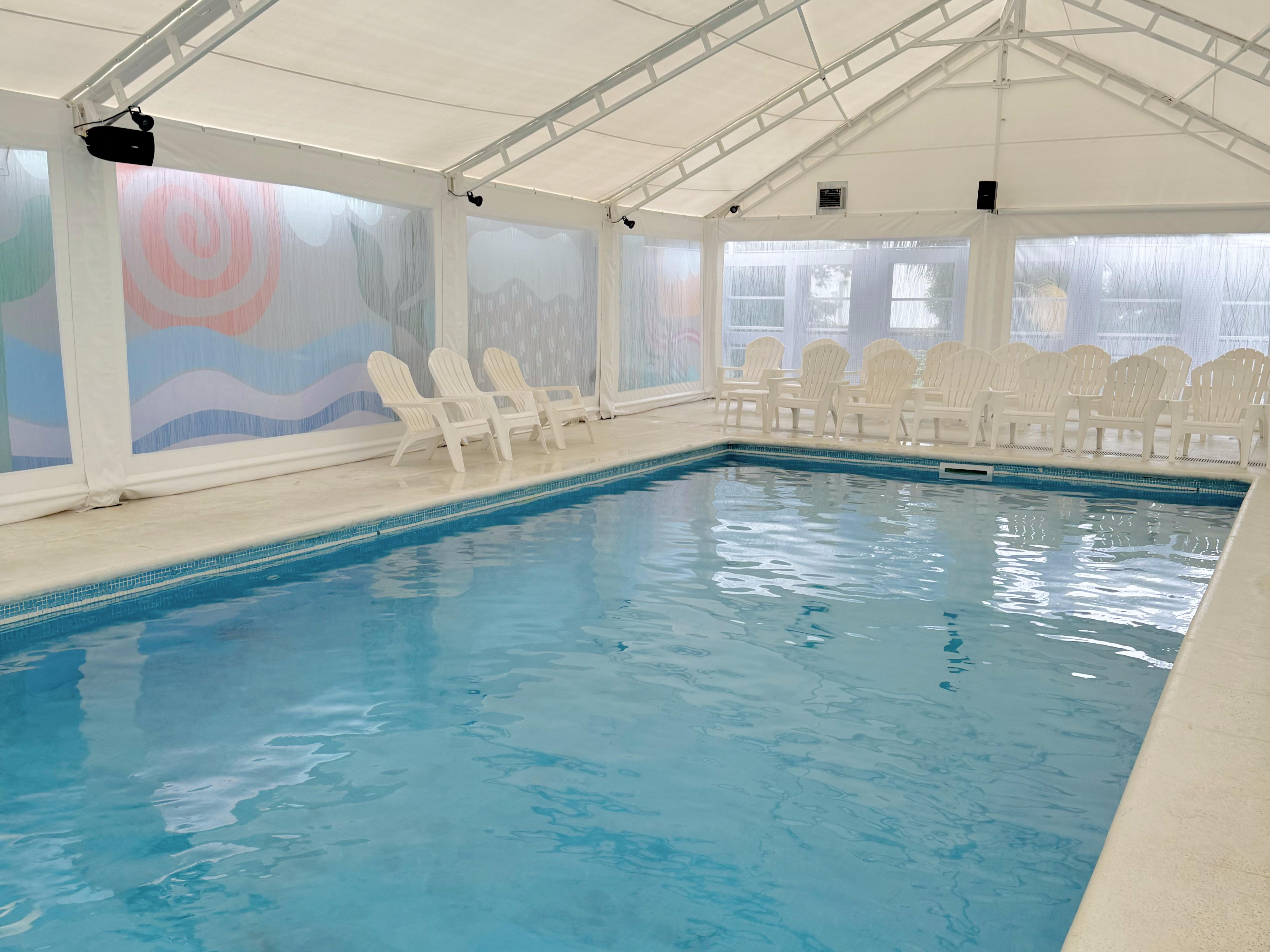 Vista Piscina Amerian Carlos Paz Apart & Suites