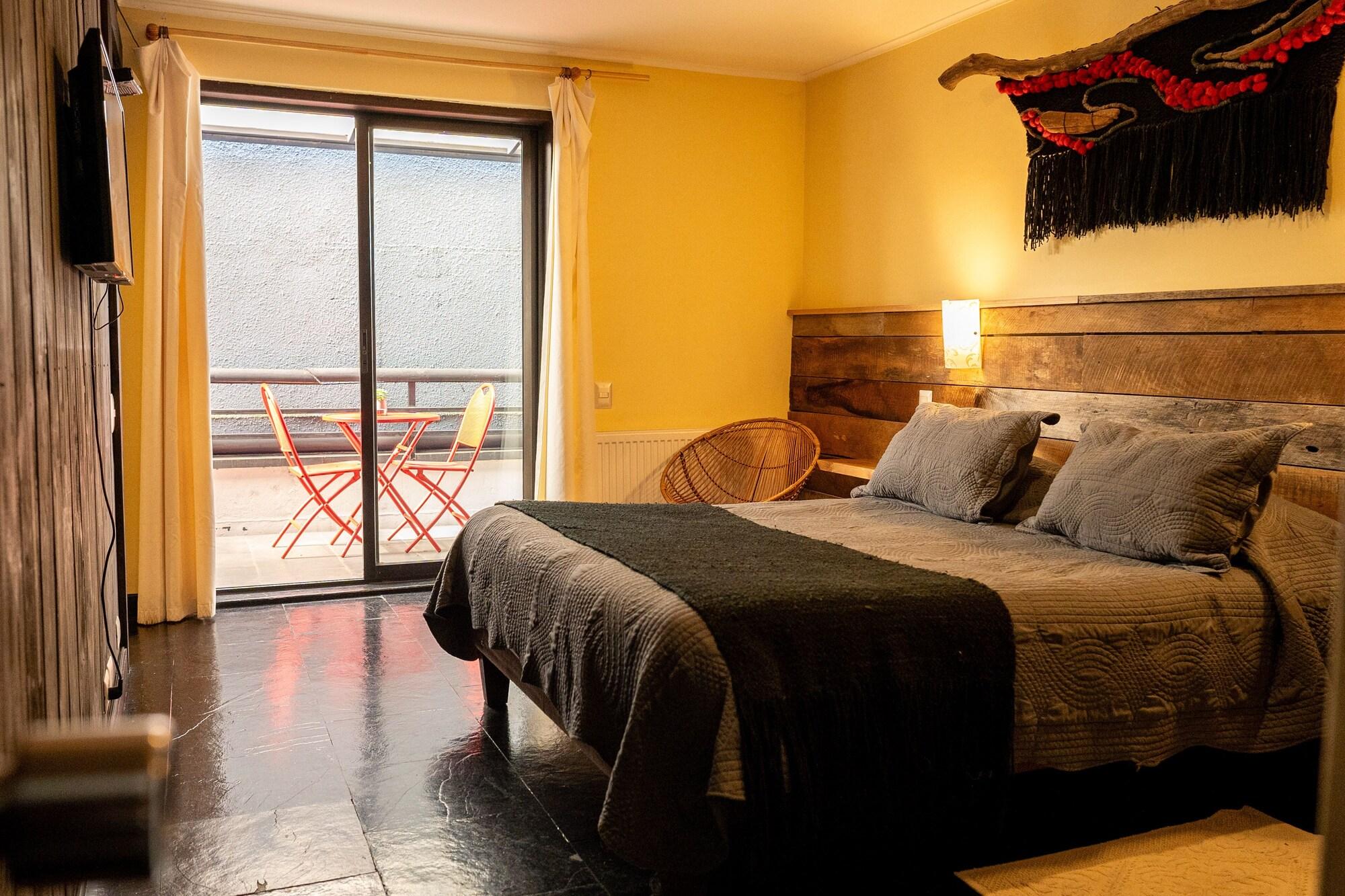 Quarto Hotel Newen BnB