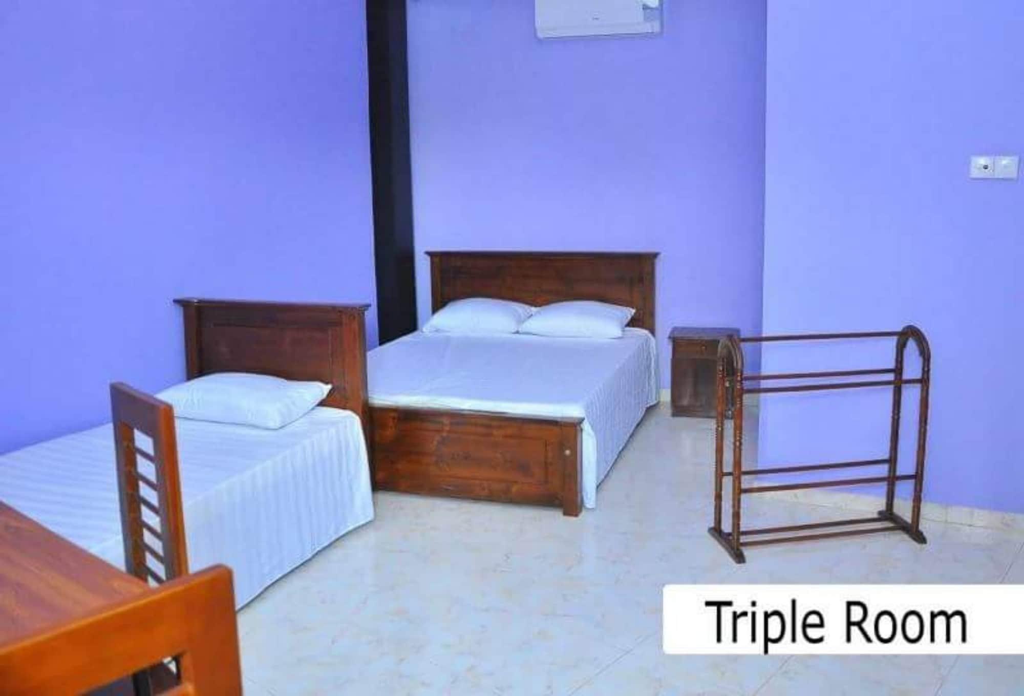 Habitación Omega Hotel & Motel