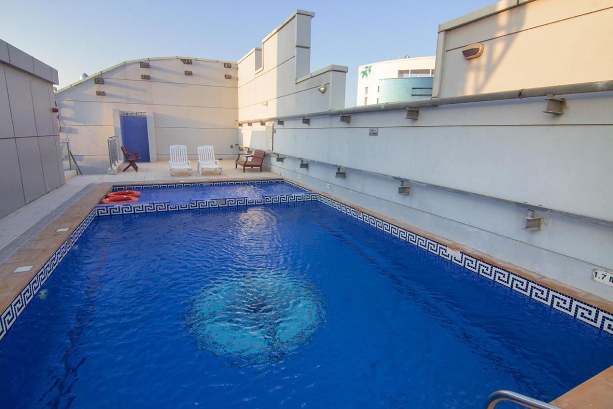 Vista Piscina Milestone Hotel Apartment