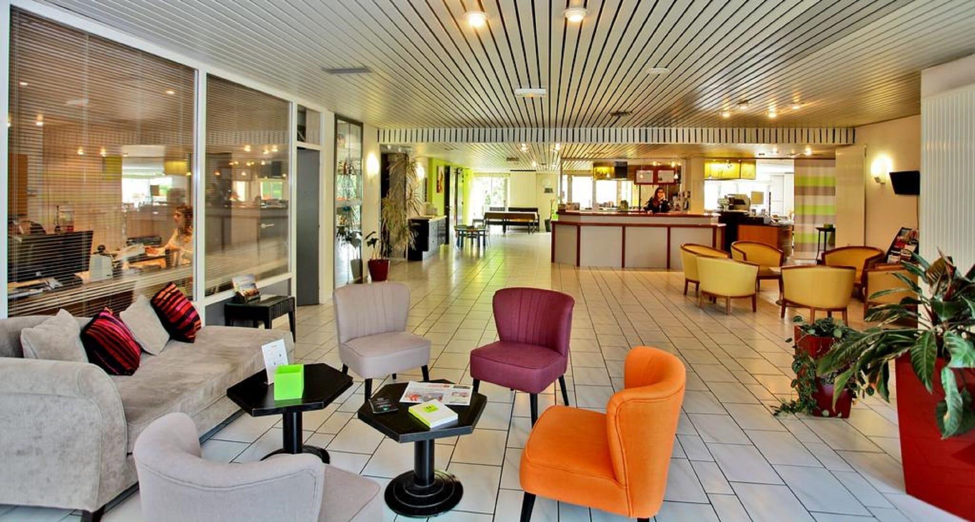 Vista do lobby Hôtel-Restaurant Aloé
