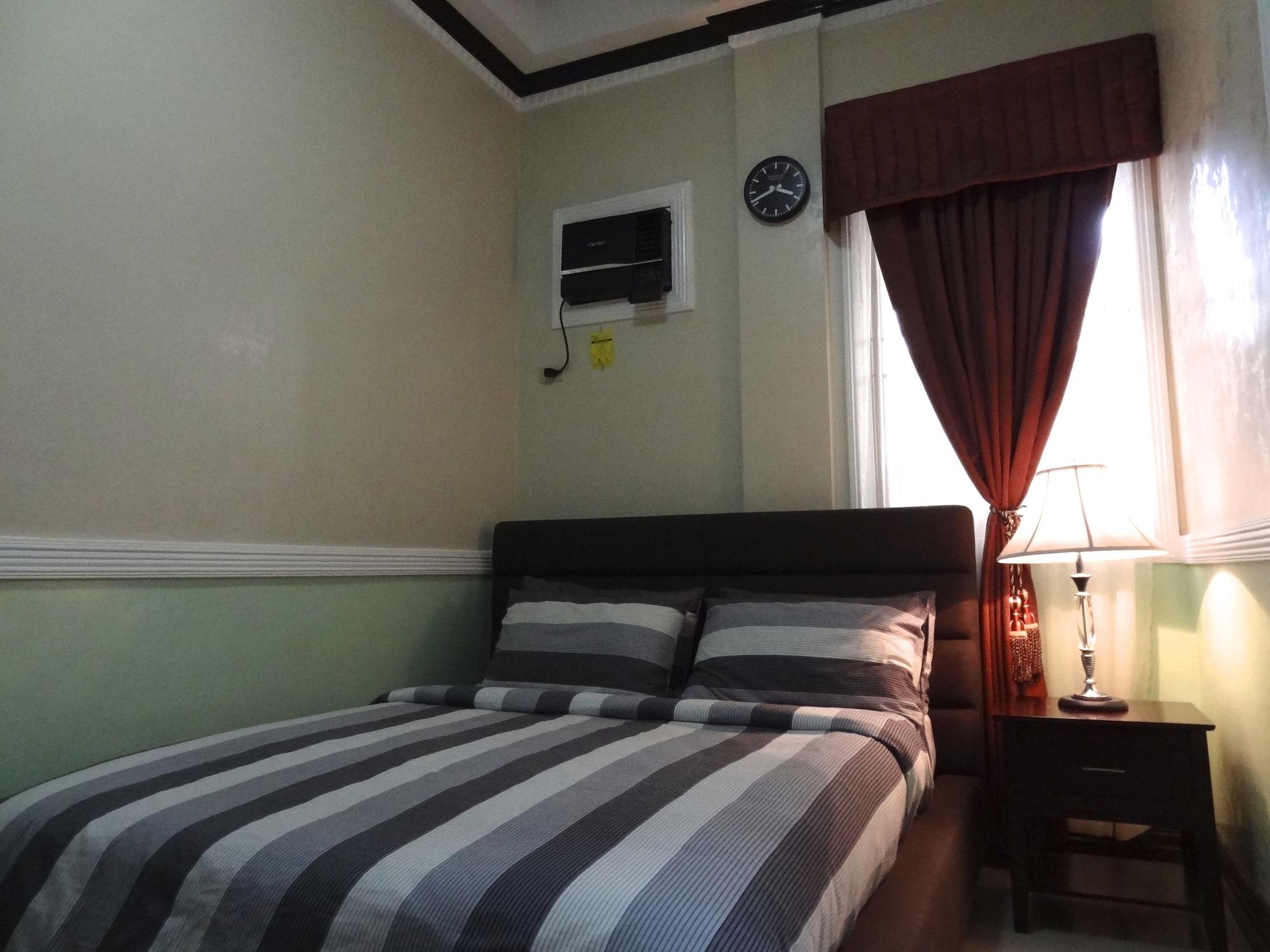Habitación The Executive Villa Inn & Suites