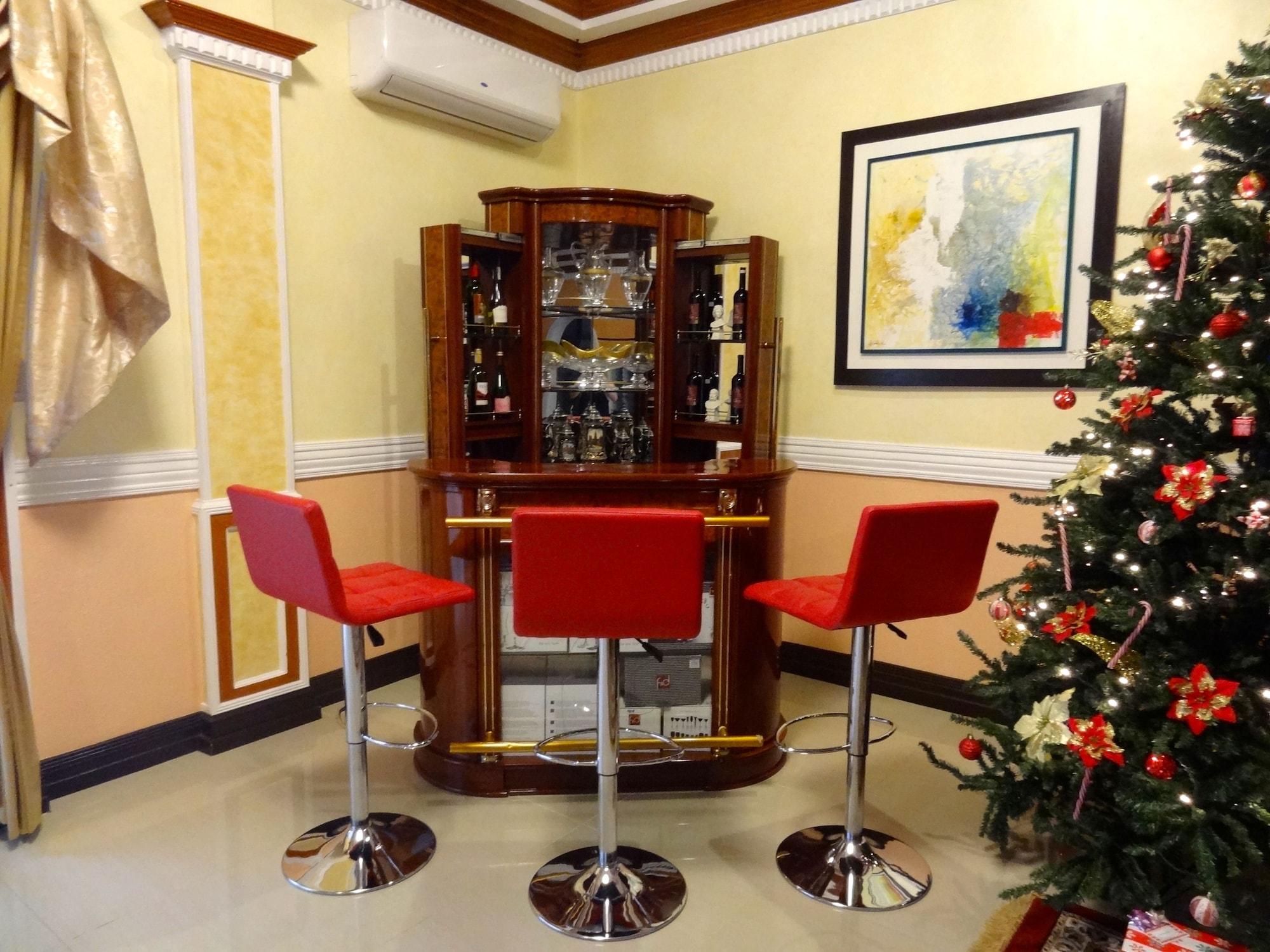 Bar/Salón The Executive Villa Inn & Suites
