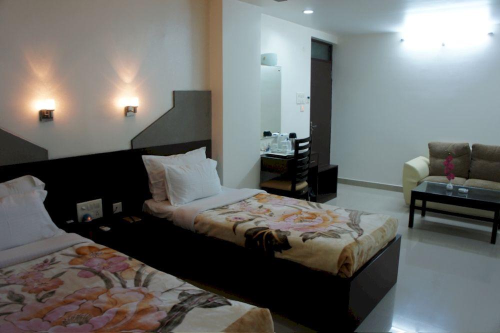 Habitación Orchid Business Luxury Hotel
