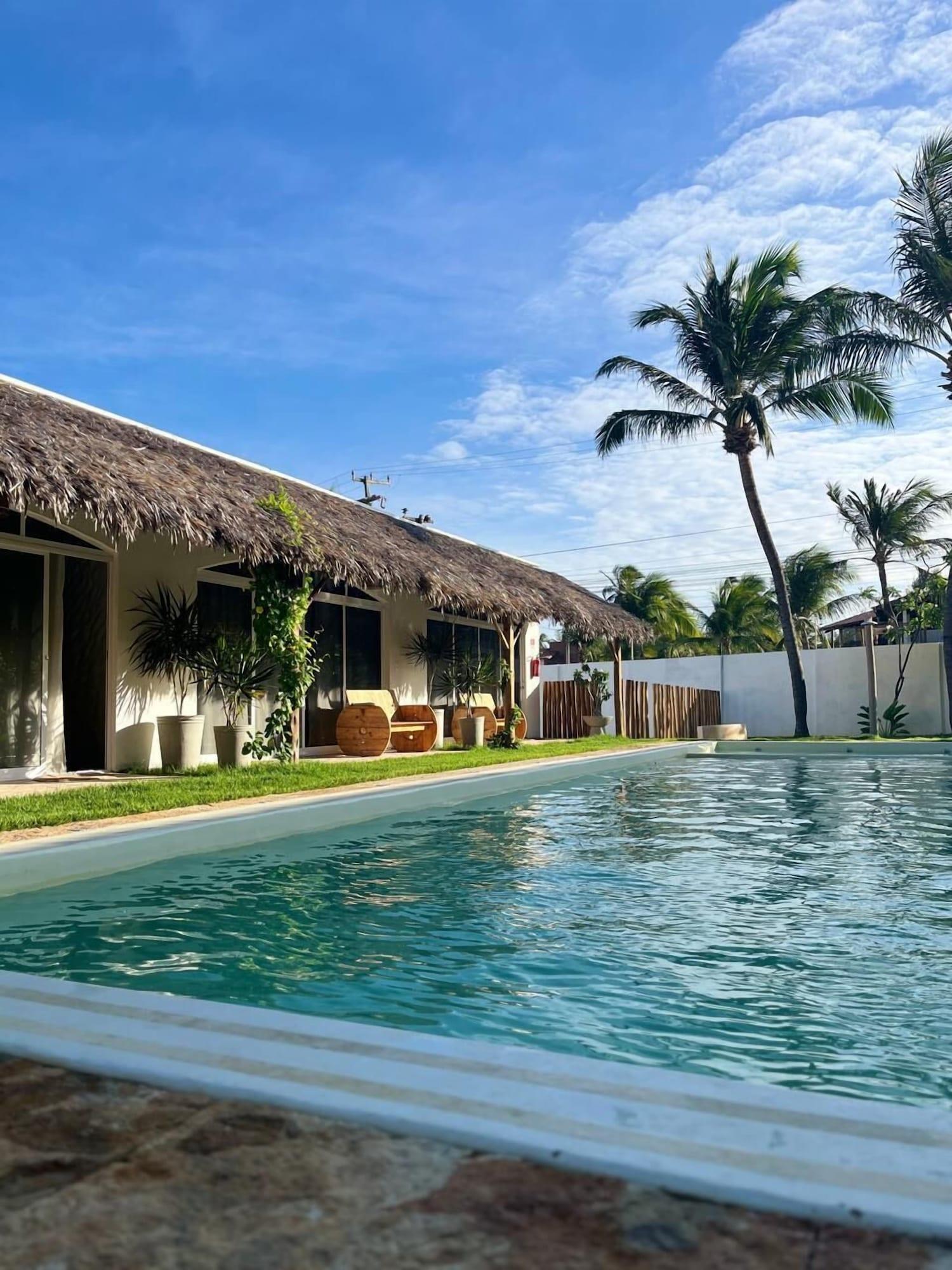 Vista da piscina Pousada Vila Flow