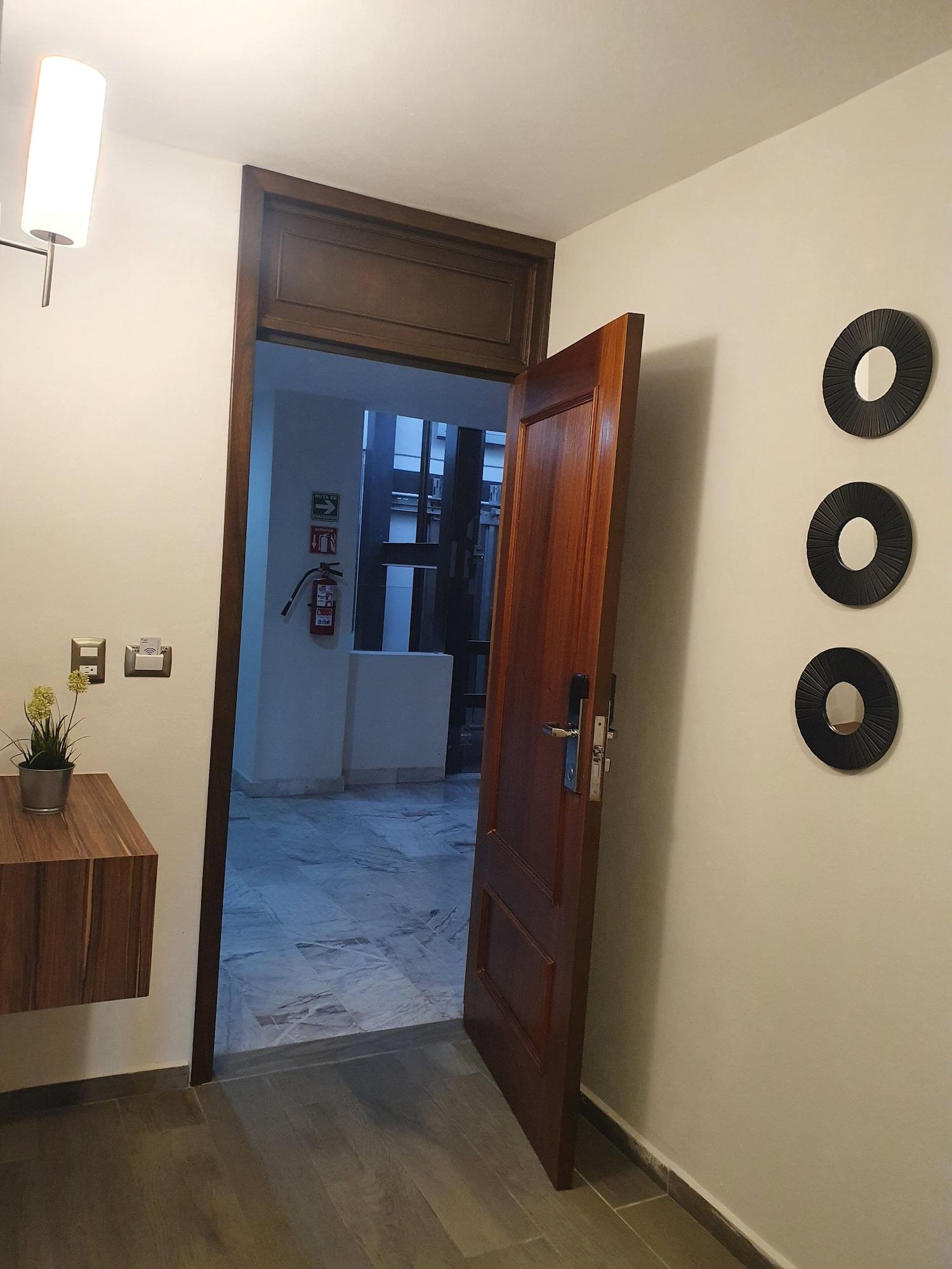 Set de Habitación Estanza Hotel & Suites