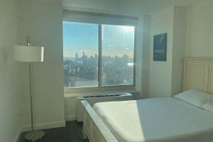 Alquiler Vacacional - Luxury 1BR • Floor-to-Ceiling Views • Steps from Empire State & MSG