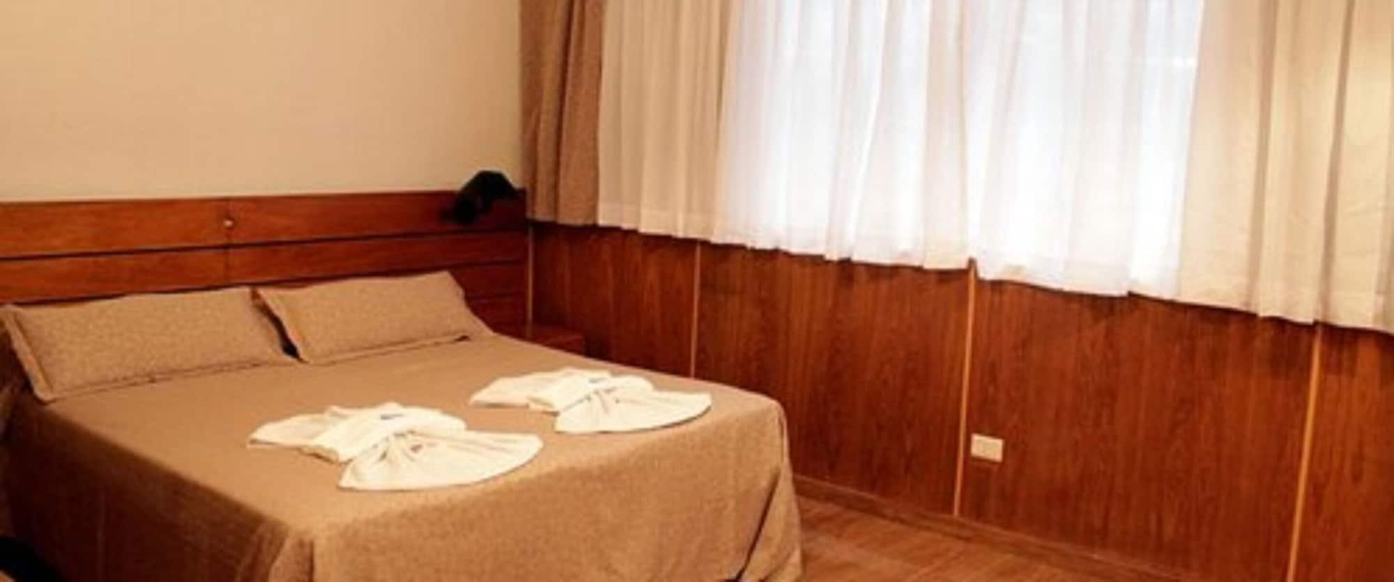 Habitación Village Garden Apart Hotel