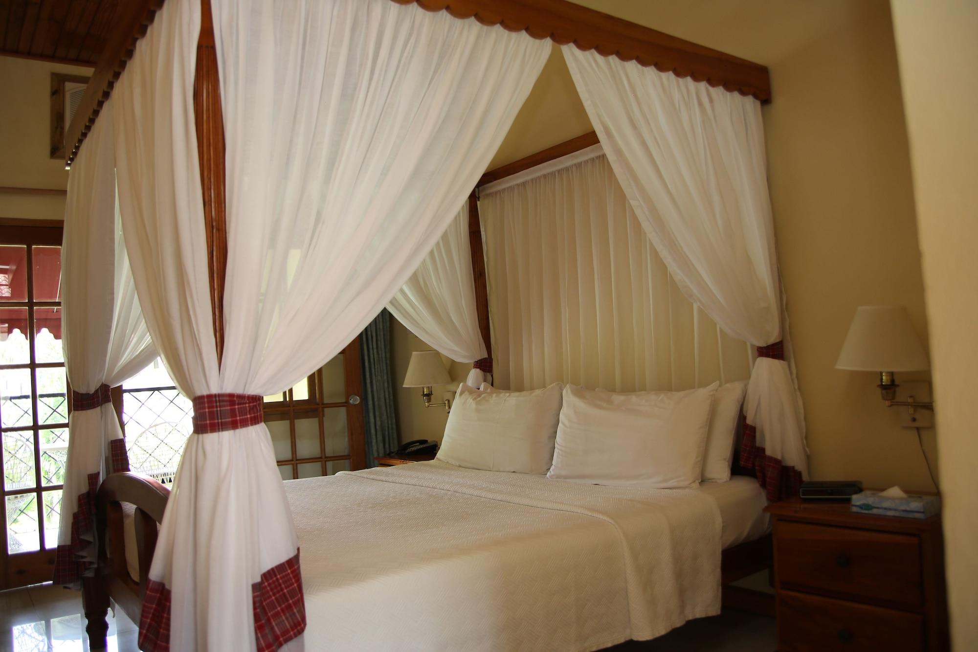Habitación Charela Inn Hotel