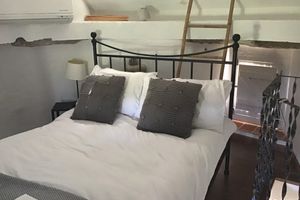 Alojamiento - The Olive Mill.  Charming refurbished Windmill with lovely views.