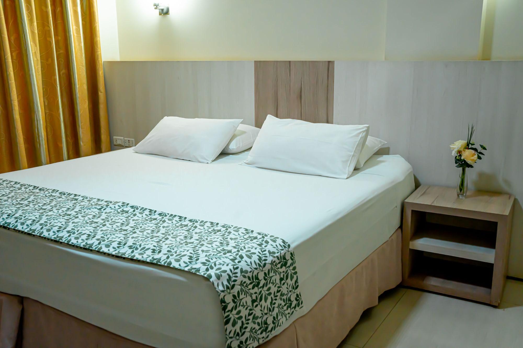 Habitación Megal Suites Hotel