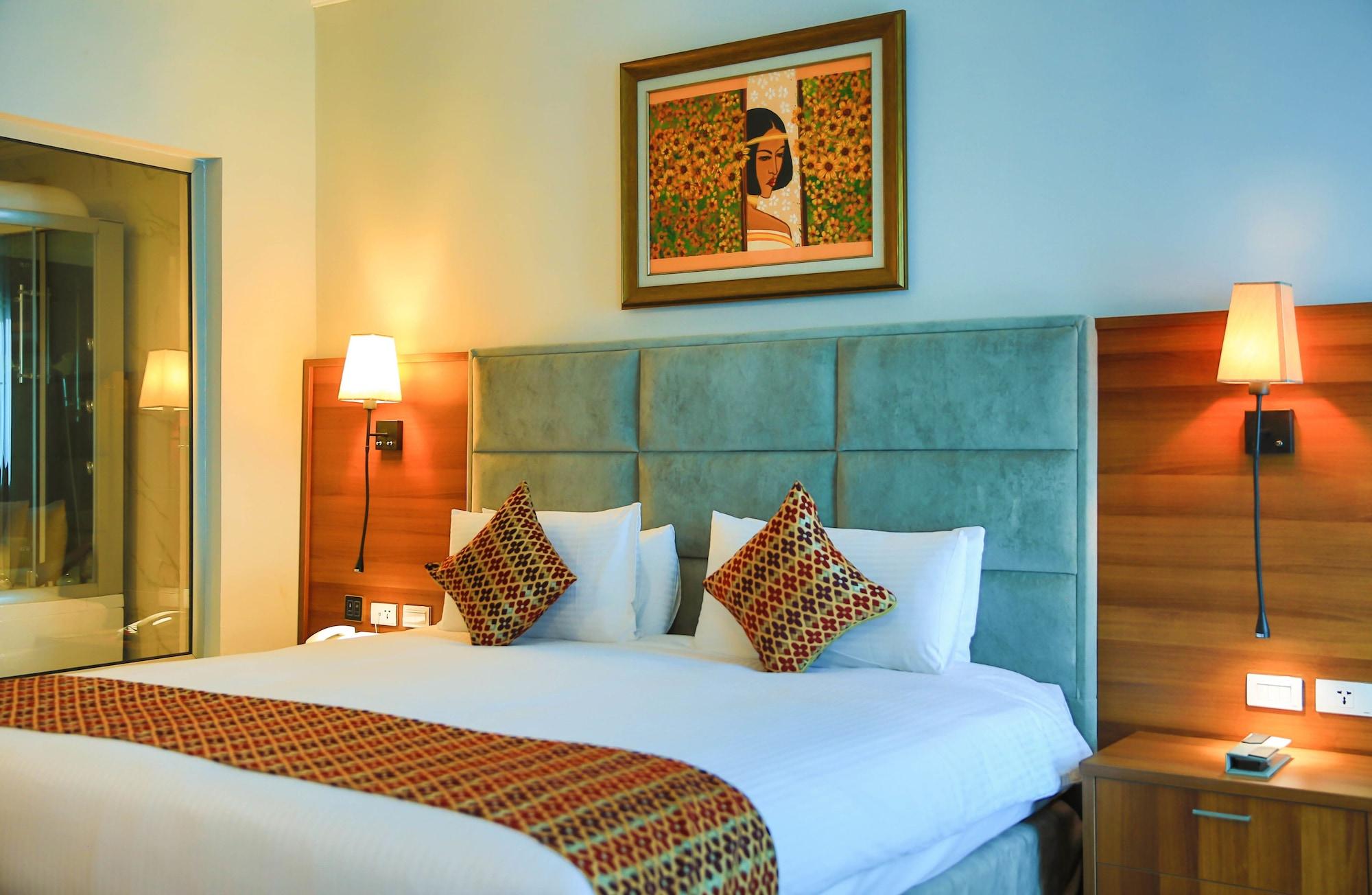 Habitación Swiss Inn Nexus Hotel