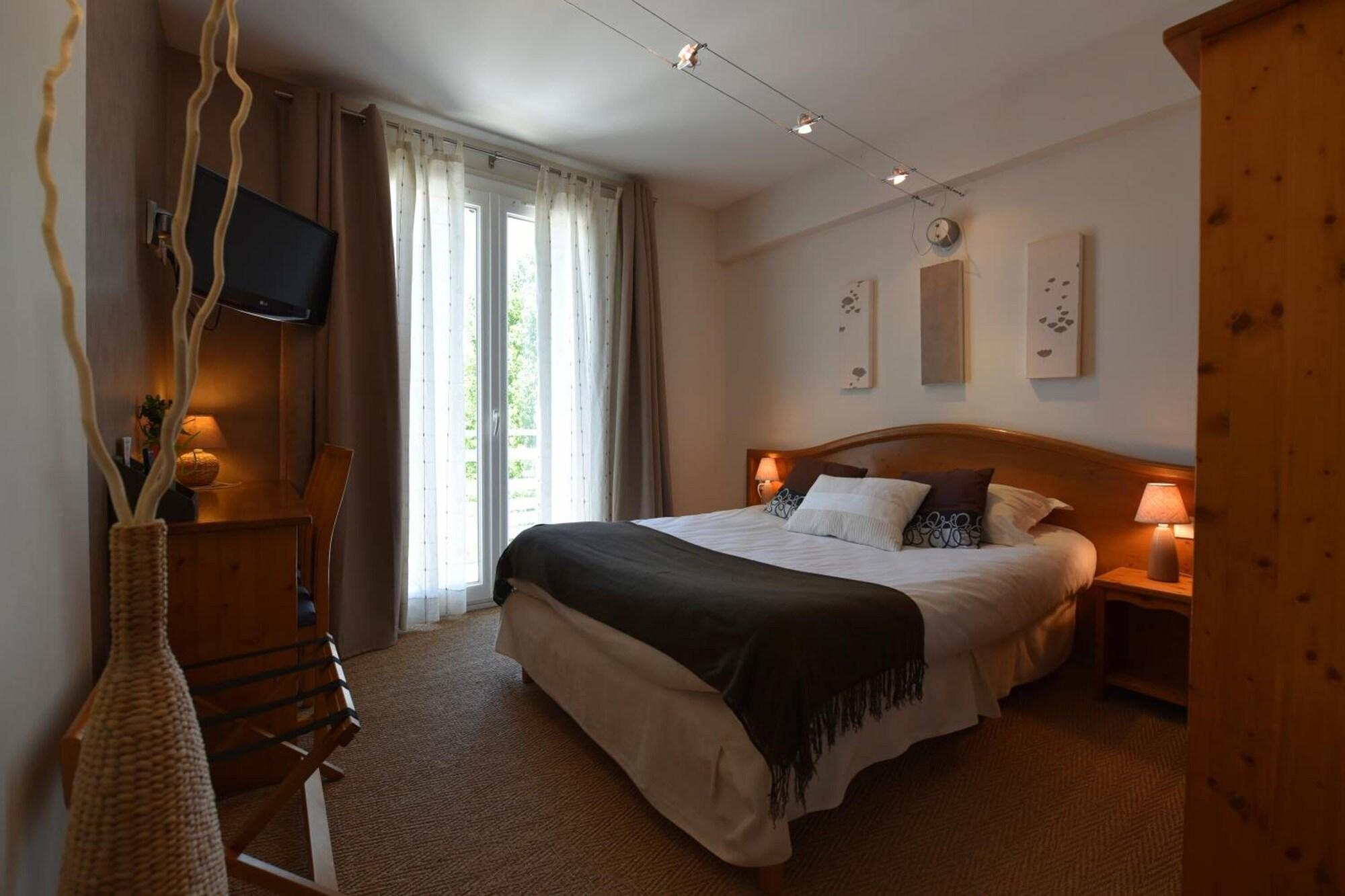 Habitación Logis Hôtel Restaurant Le Castel Fleuri