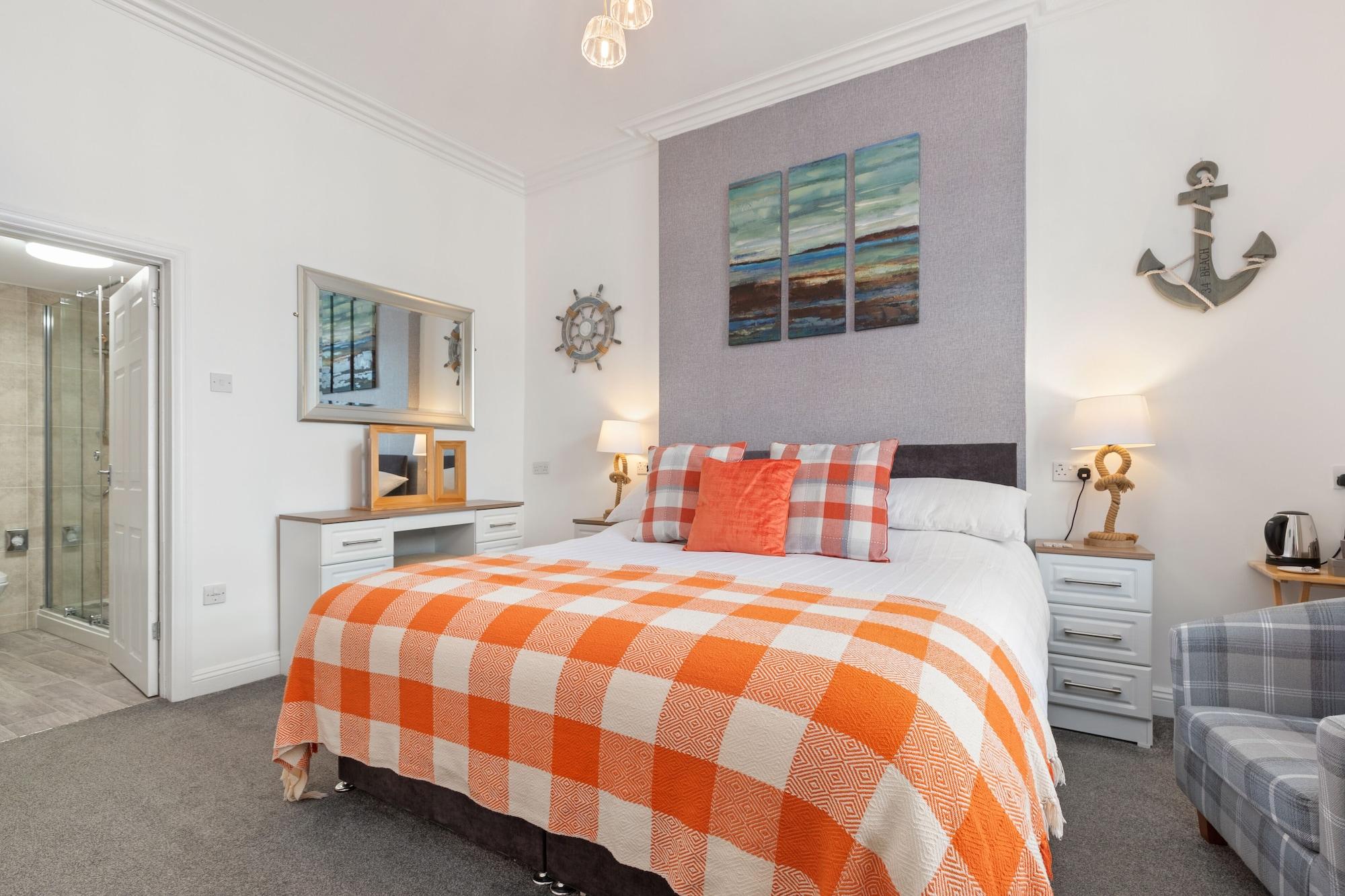 Varios Coach Guest House