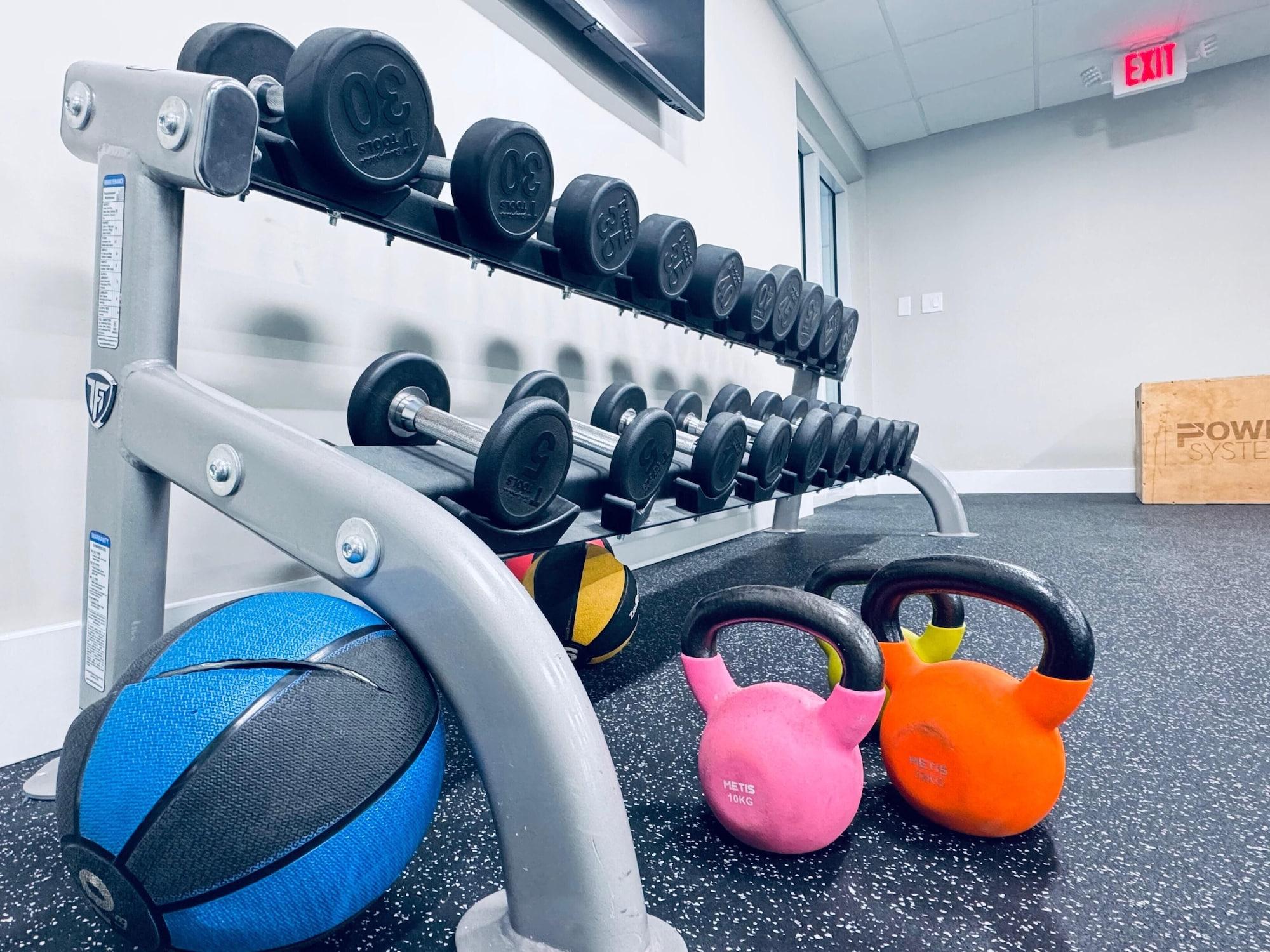 Gimnasio OASIS BAY SUITES, Tampa, Busch Gardens, USF