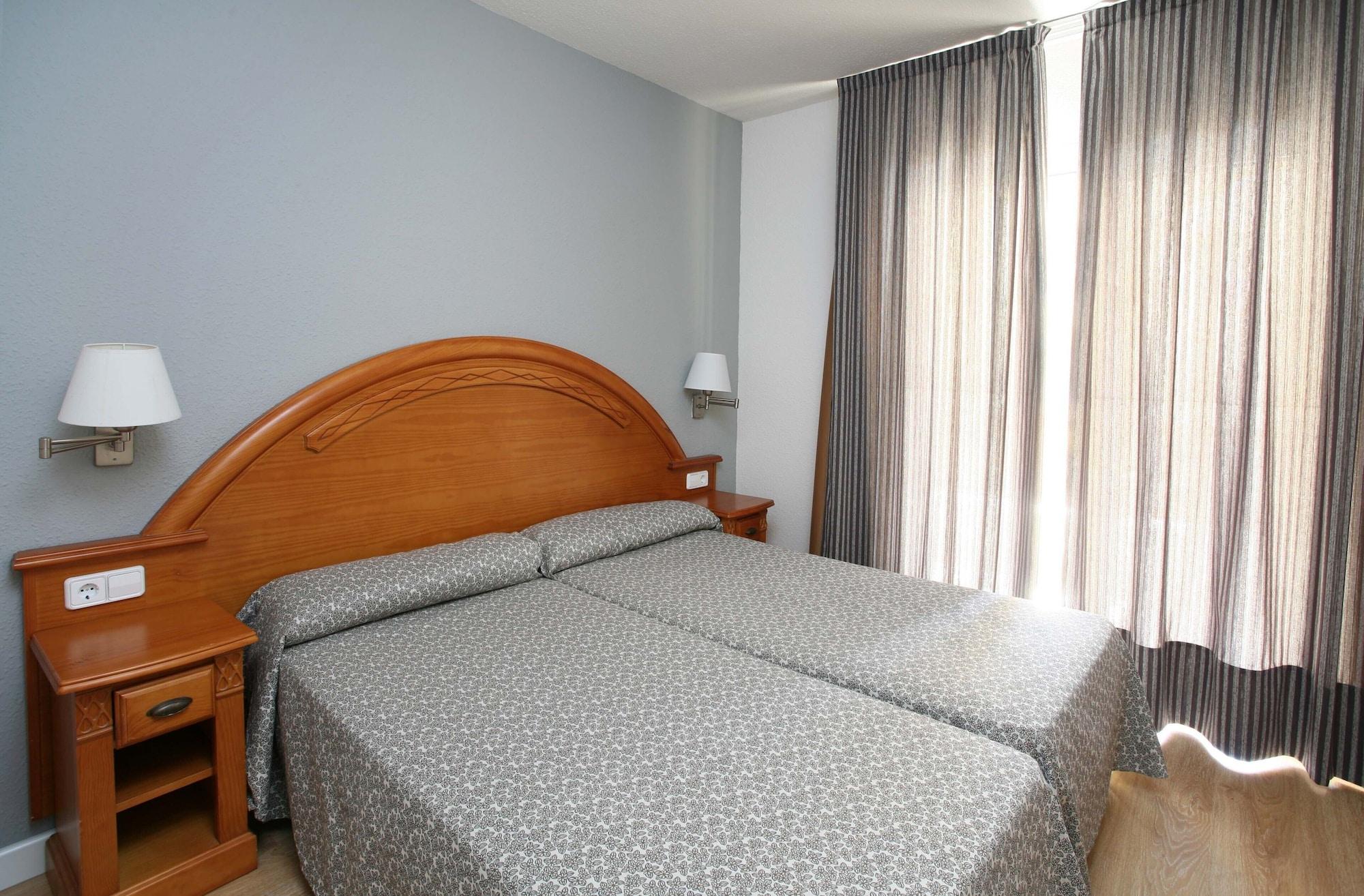 Habitación Apartamentos Turísticos Jardines del Plaza