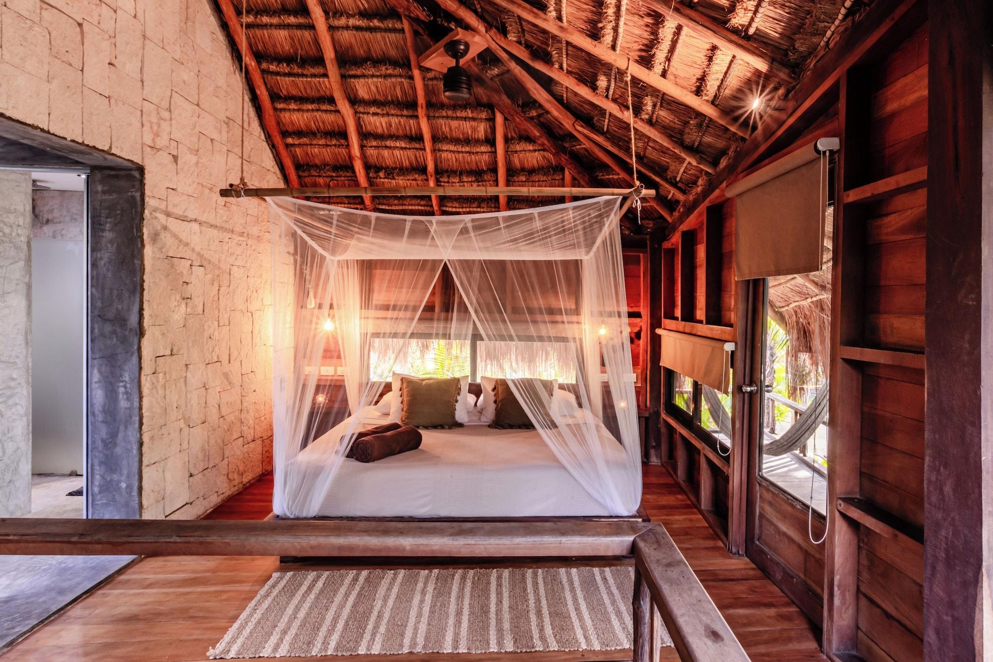 Habitación Tulum Vida Silvestre Cabañas