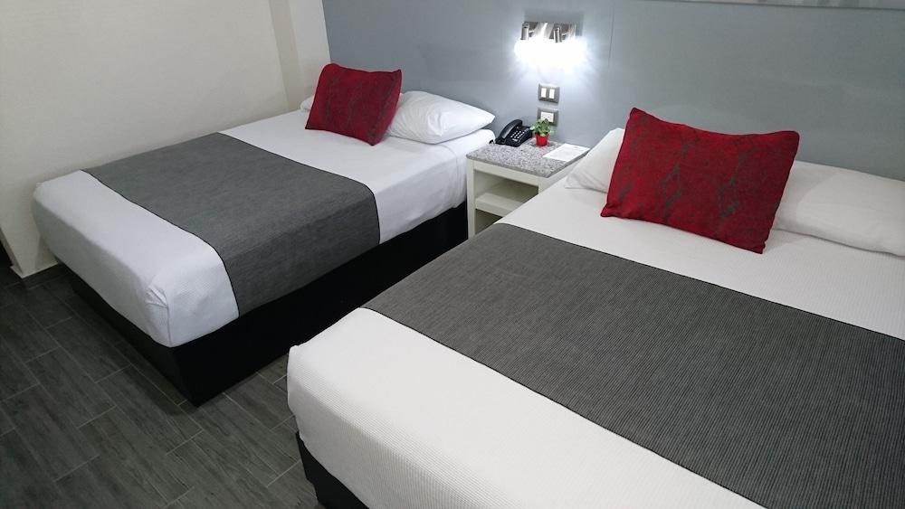 Habitación Home Suites Rotarismo
