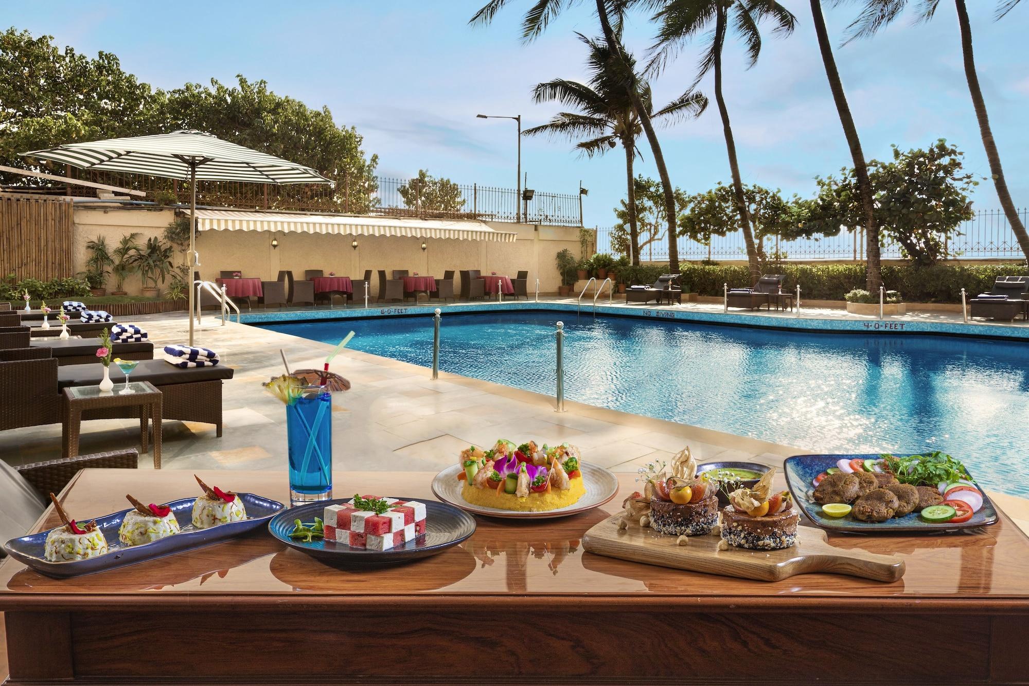 Vista Piscina Ramada Plaza by Wyndham Palm Grove