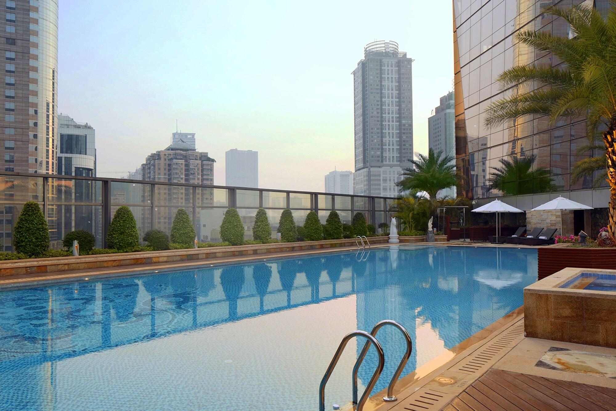 Vista Piscina DoubleTree by Hilton Guangzhou-Free Shuttle Bus to Canton Fair Complex & Overseas Buyer Registration Services during Canton Fair Period