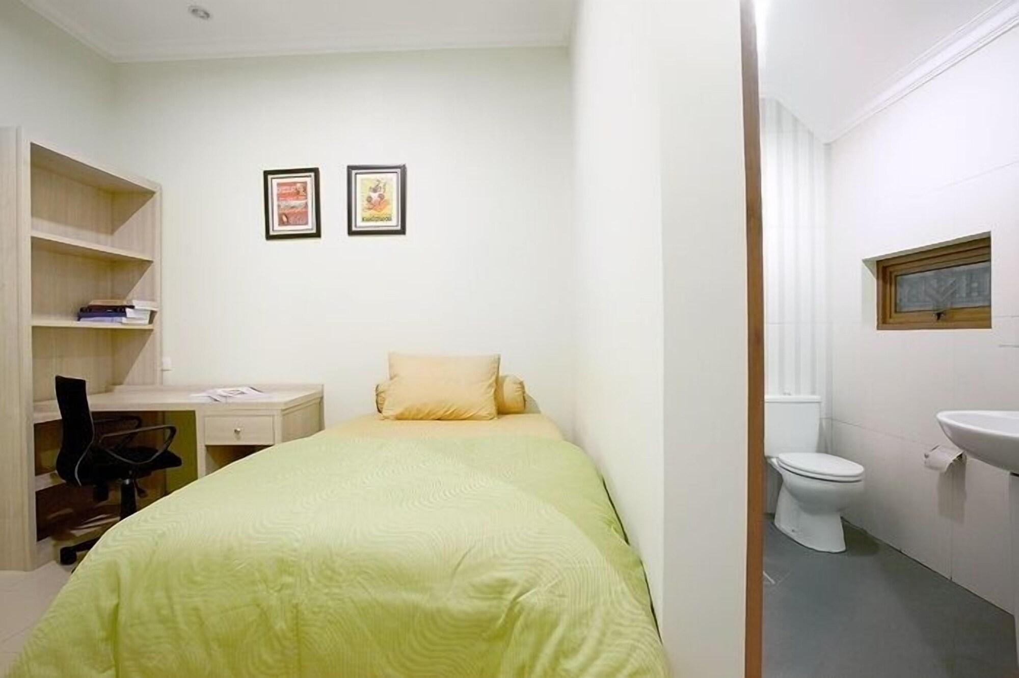 Habitación Rumah Aca