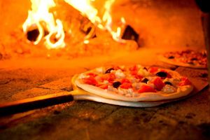 Passeio - Escola de Pizza: Aprenda a autêntica arte de fazer pizza.