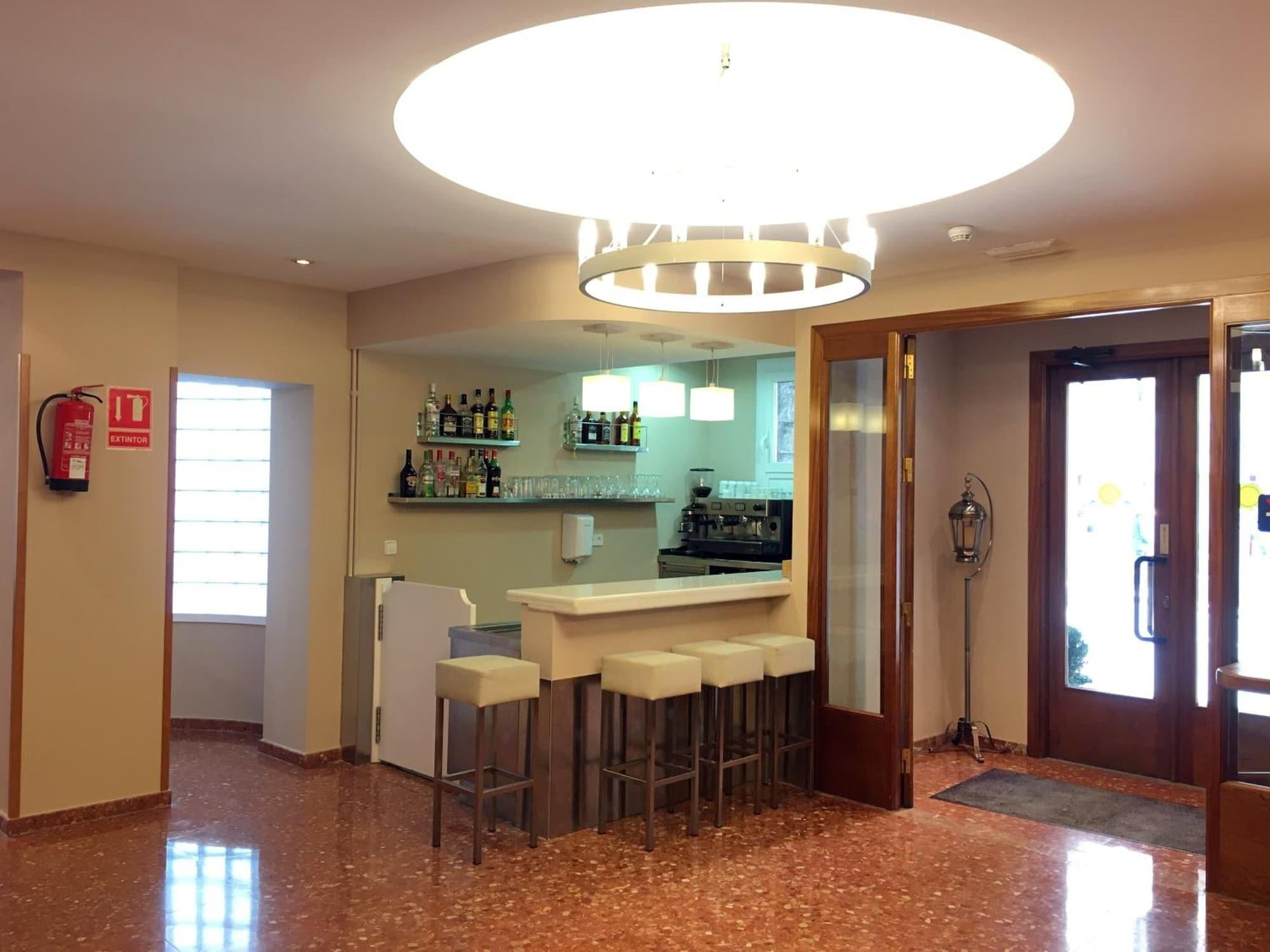 Bar/Salón Evenia Oros