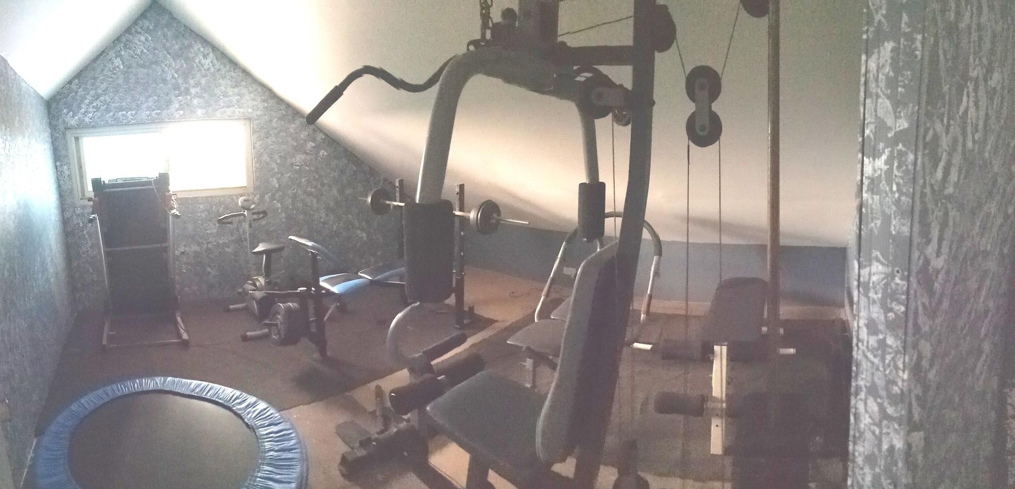 Gimnasio Grand Peninsula Suites