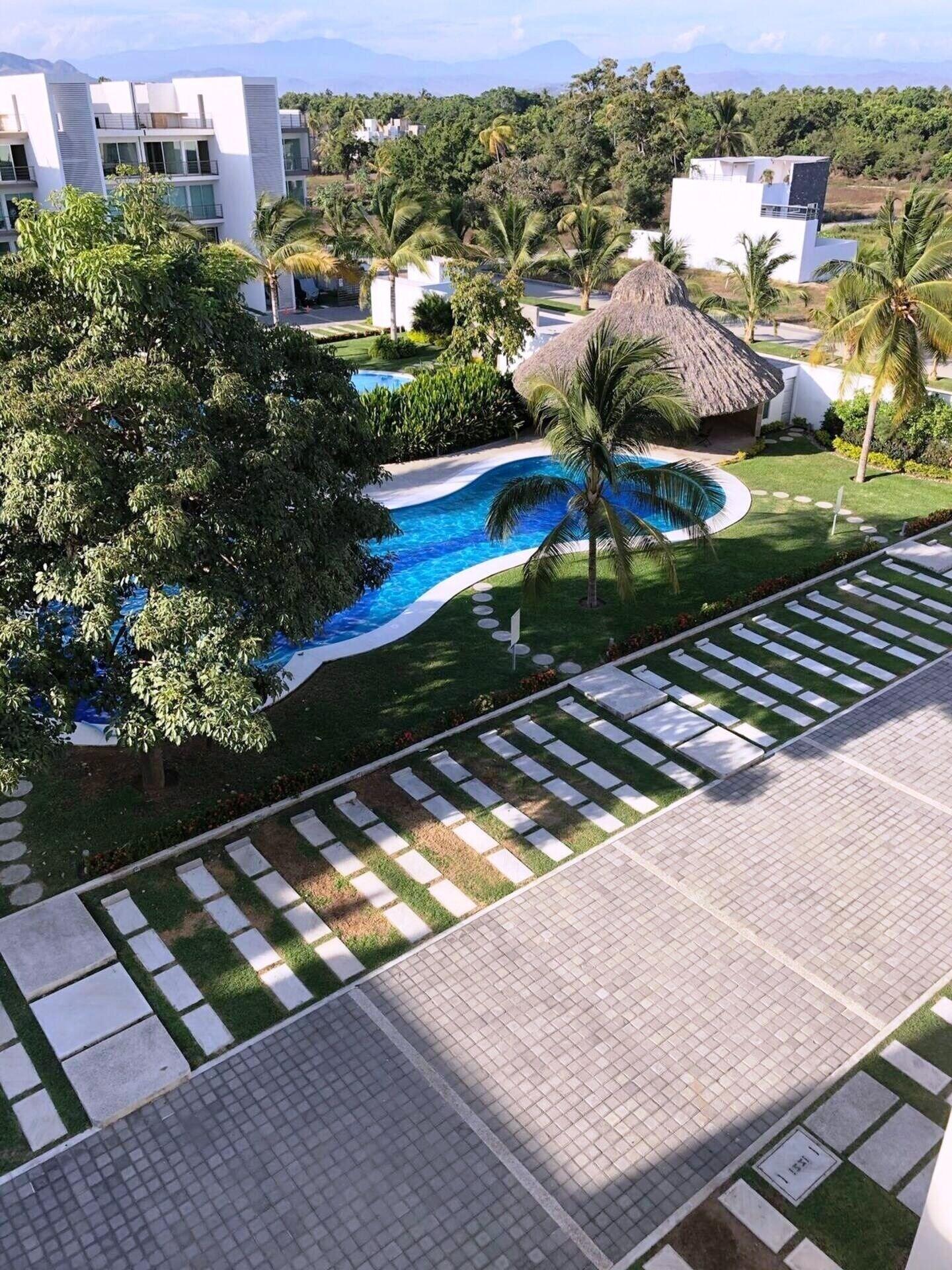 Vista Piscina CONDOS DR