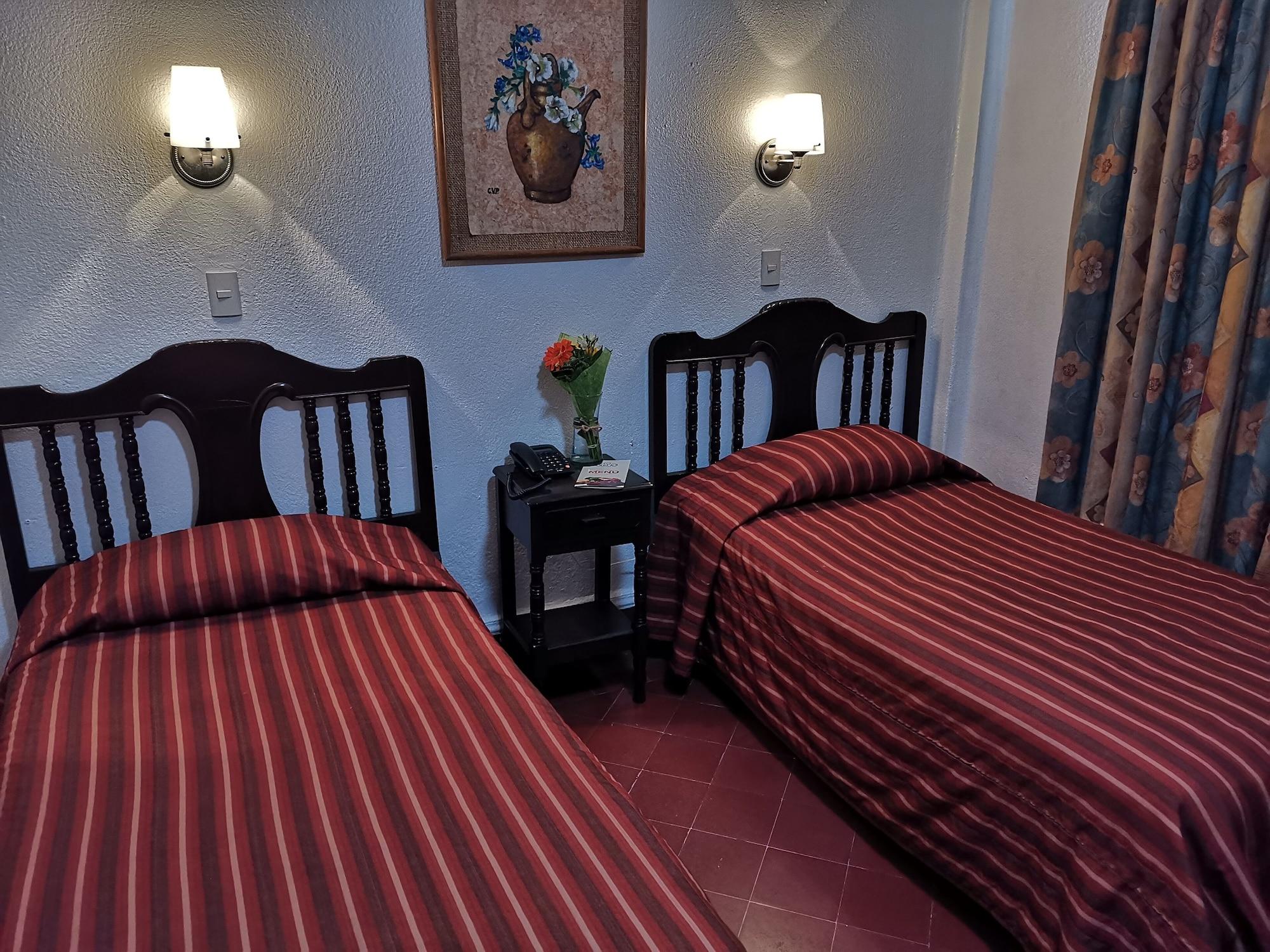 Habitación Hotel 5a Avenida
