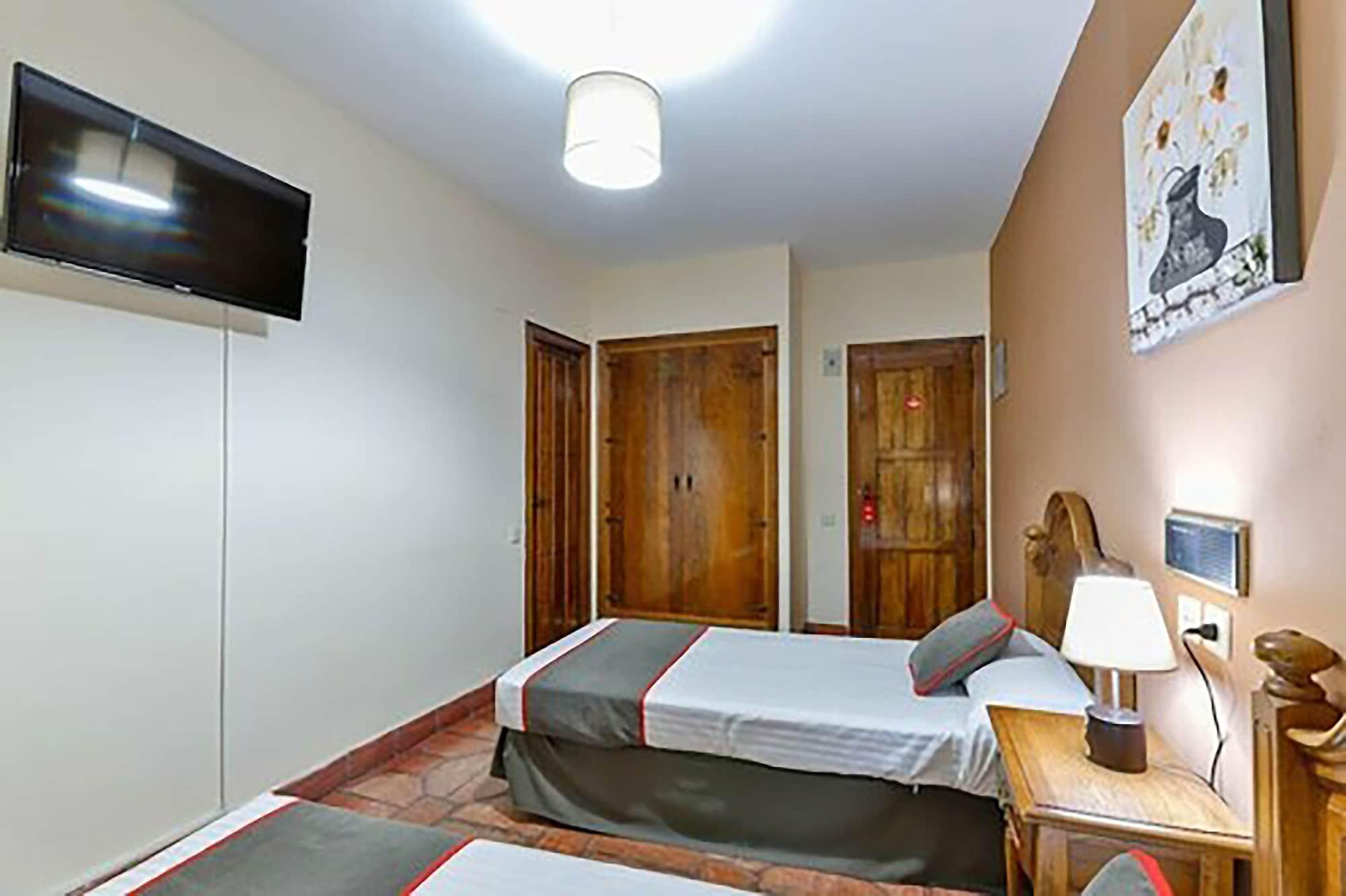 Habitación Hostal Alfonso XI