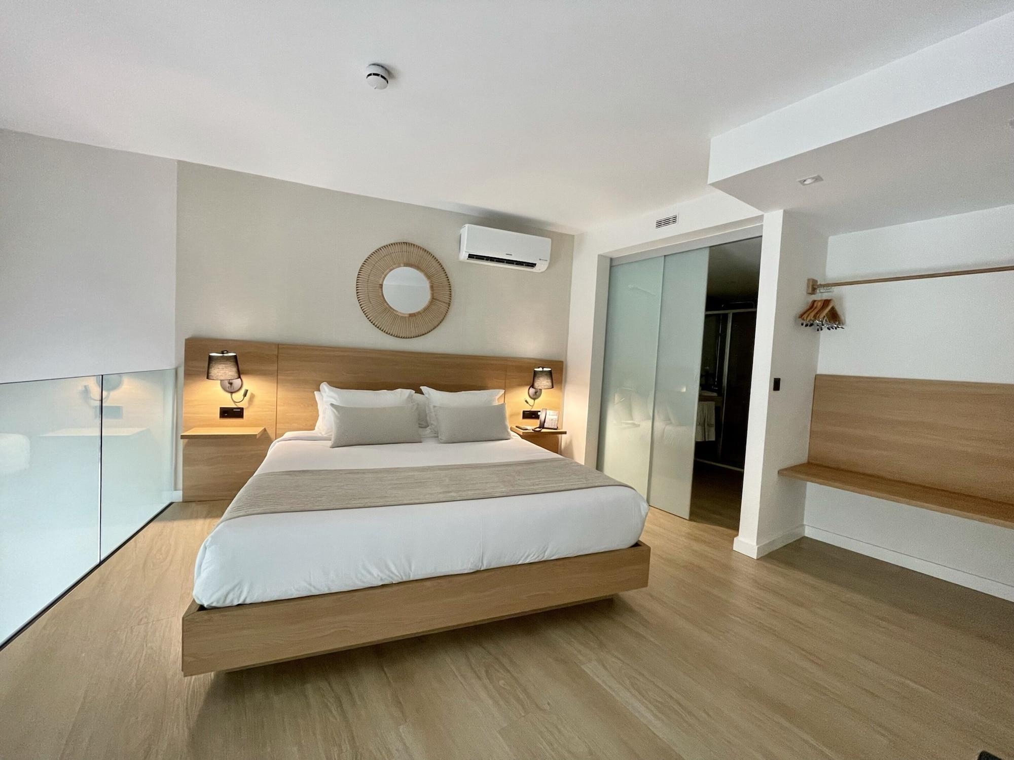 Habitación Hotel emblemático Hi Suites