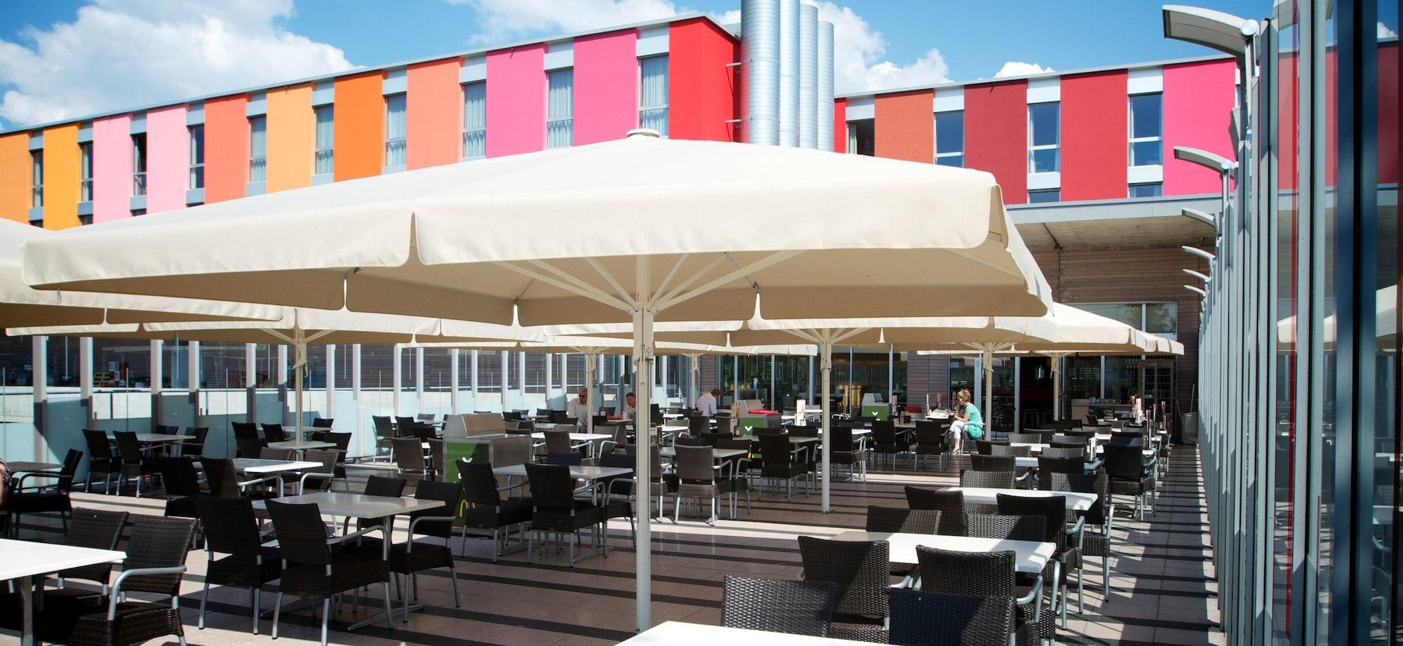 Restaurant B&B Hotel Lully 3 Lakes