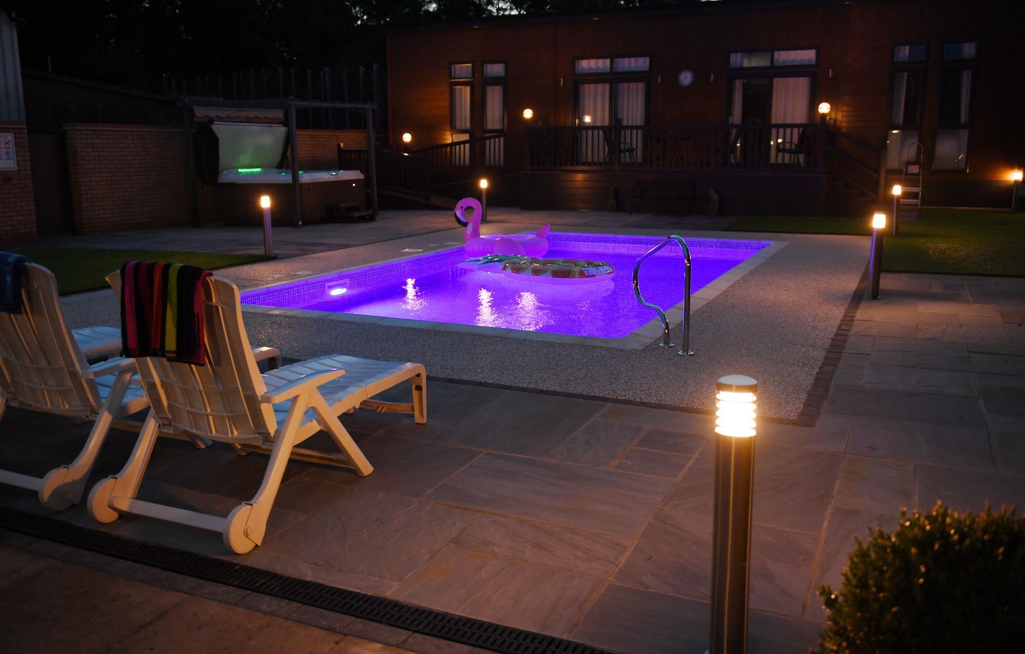 Vista Piscina Spanhoe Lodge - B&B