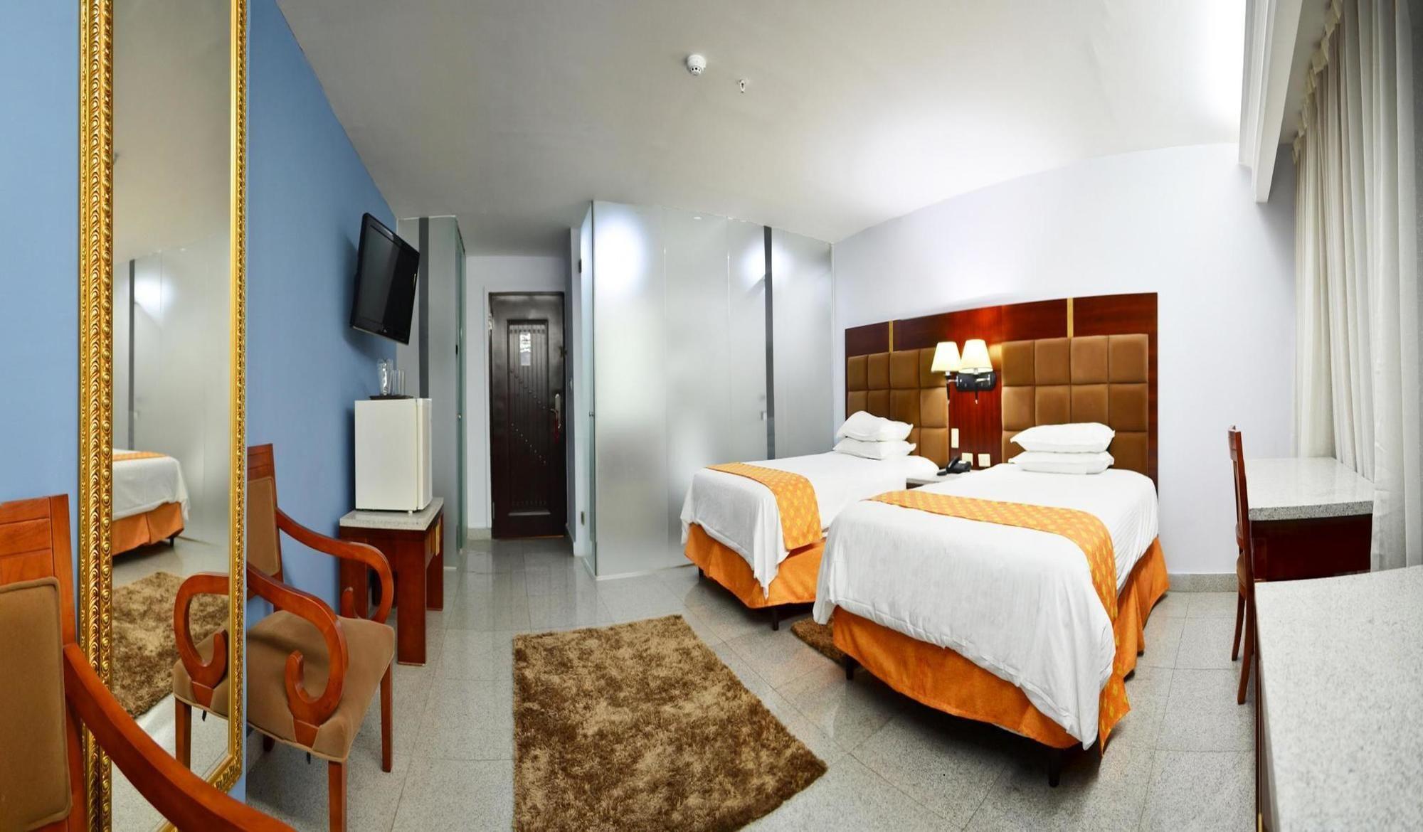 Habitación Grand International Hotel