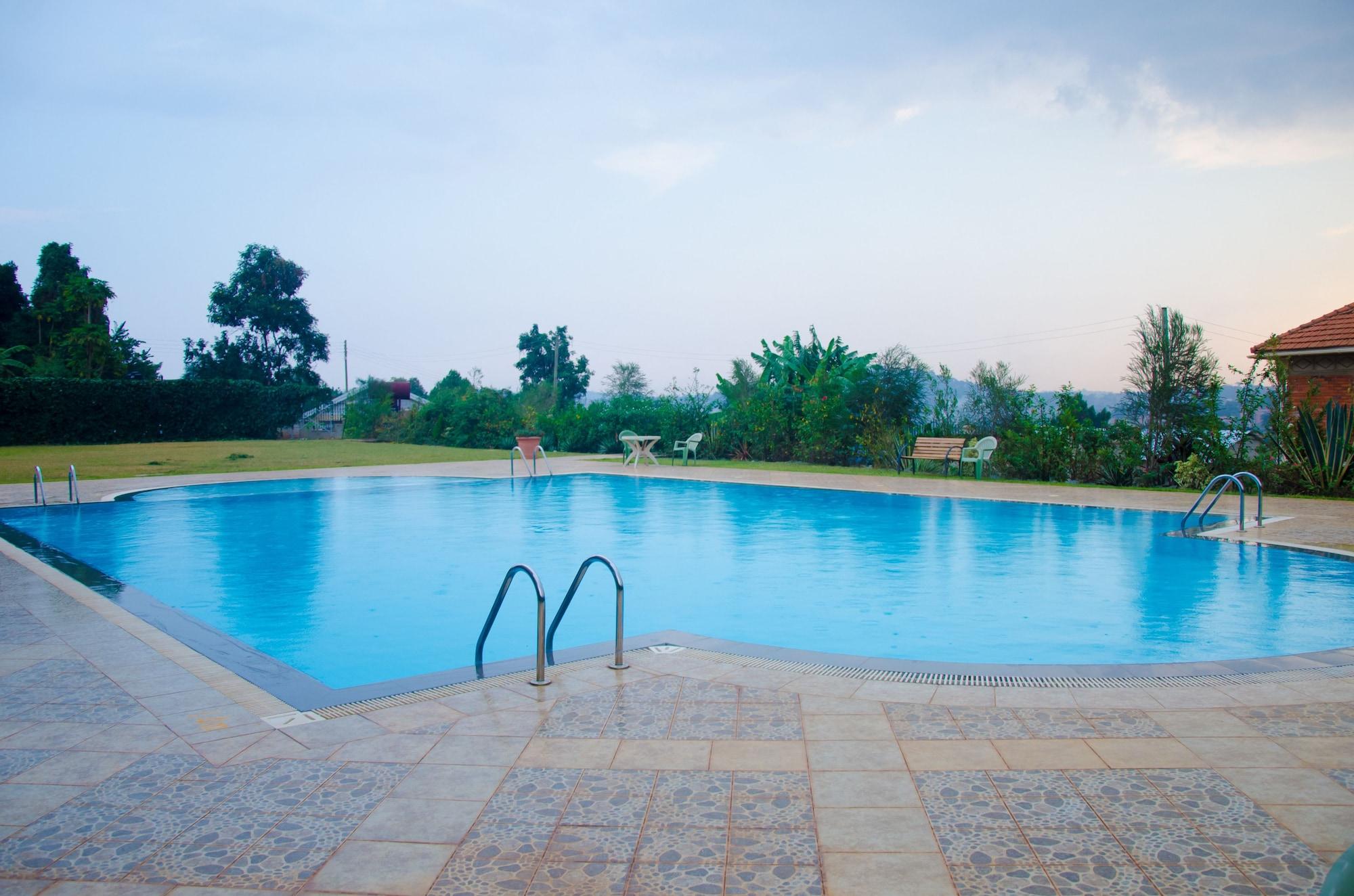 Vista Piscina Afrique Suites Hotel