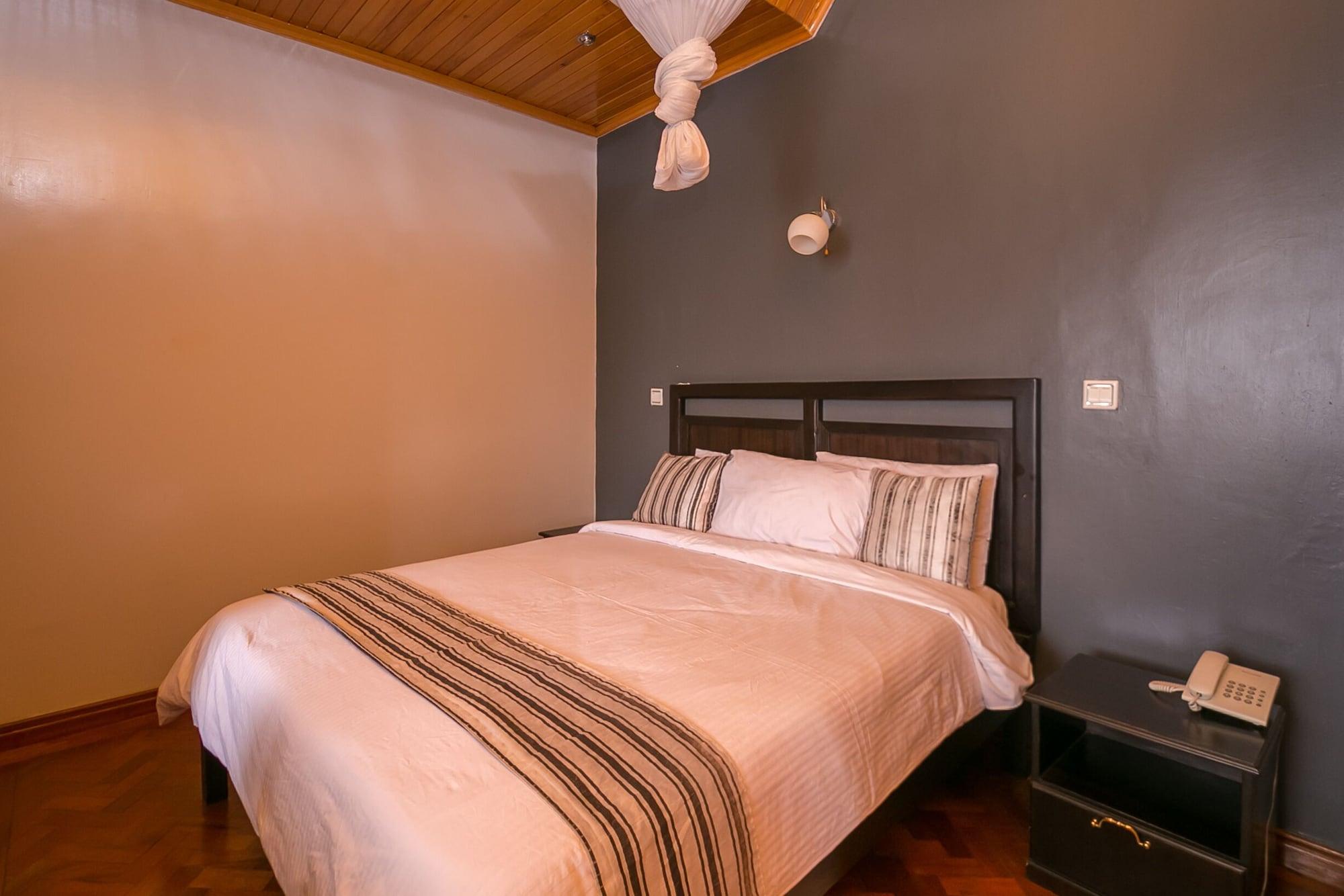 Habitación Meltonia Luxury Suites