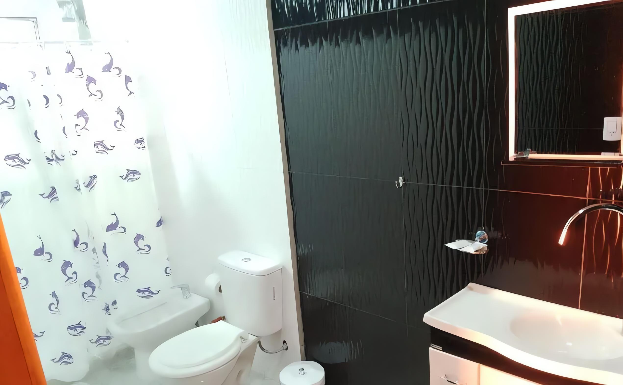 Comodidades do quarto El Uru Suite Hotel