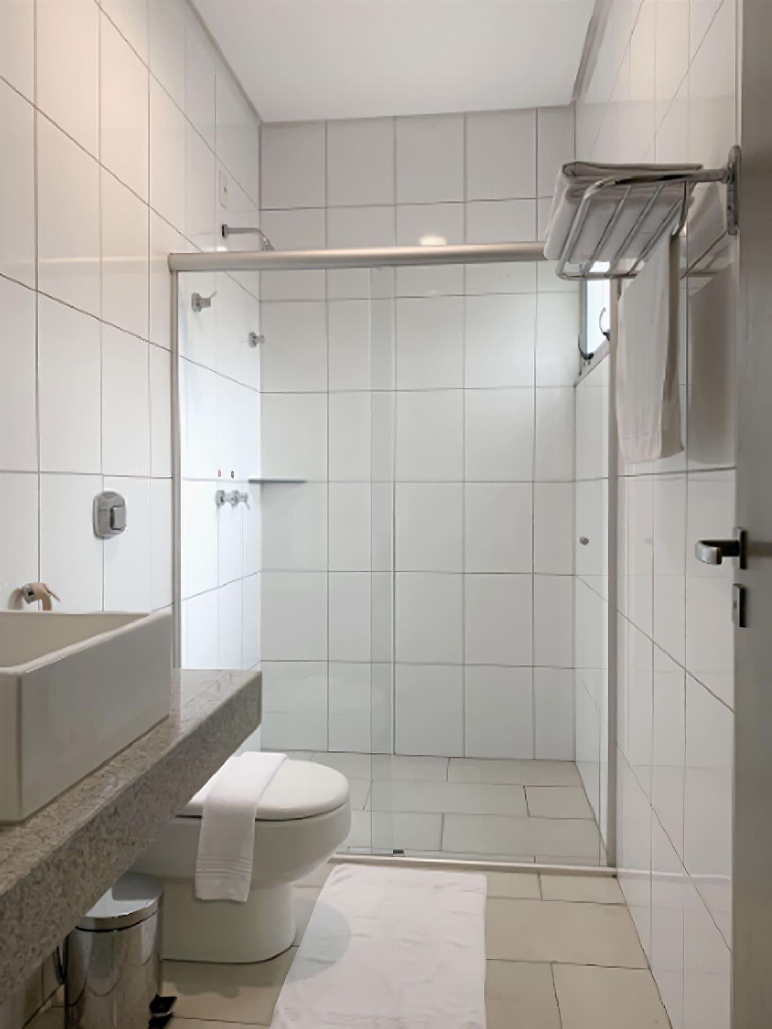 Comodidades do quarto Oasis Hotel