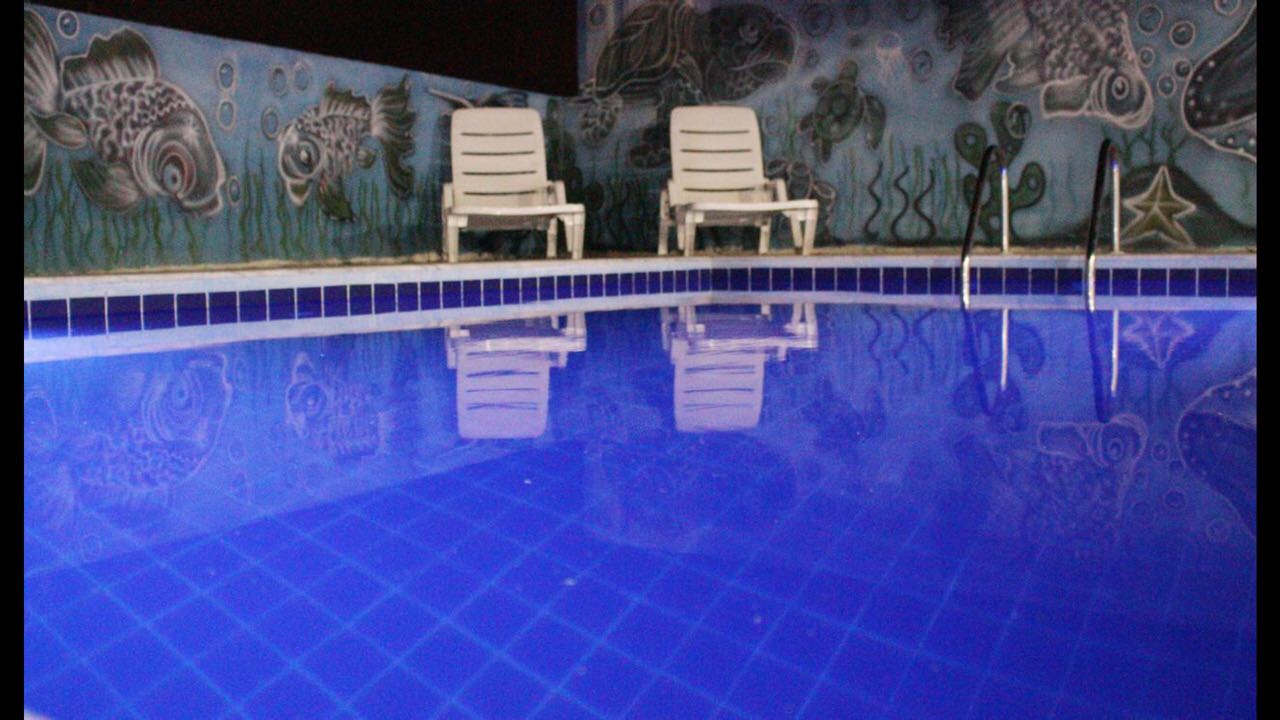 Vista Piscina Pousada Mangueville