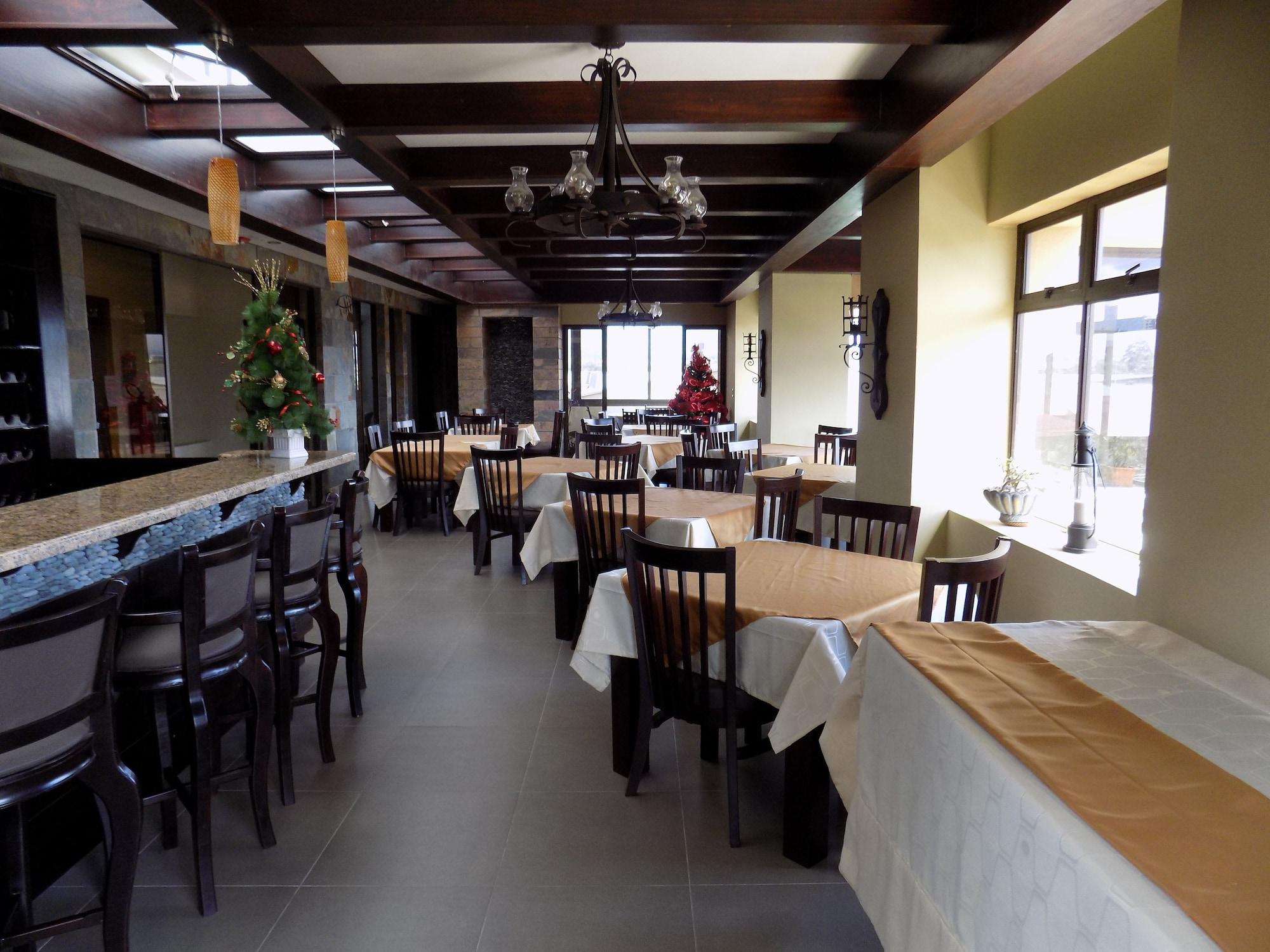Restaurant Hotel Plaza Real Suites & Apartments