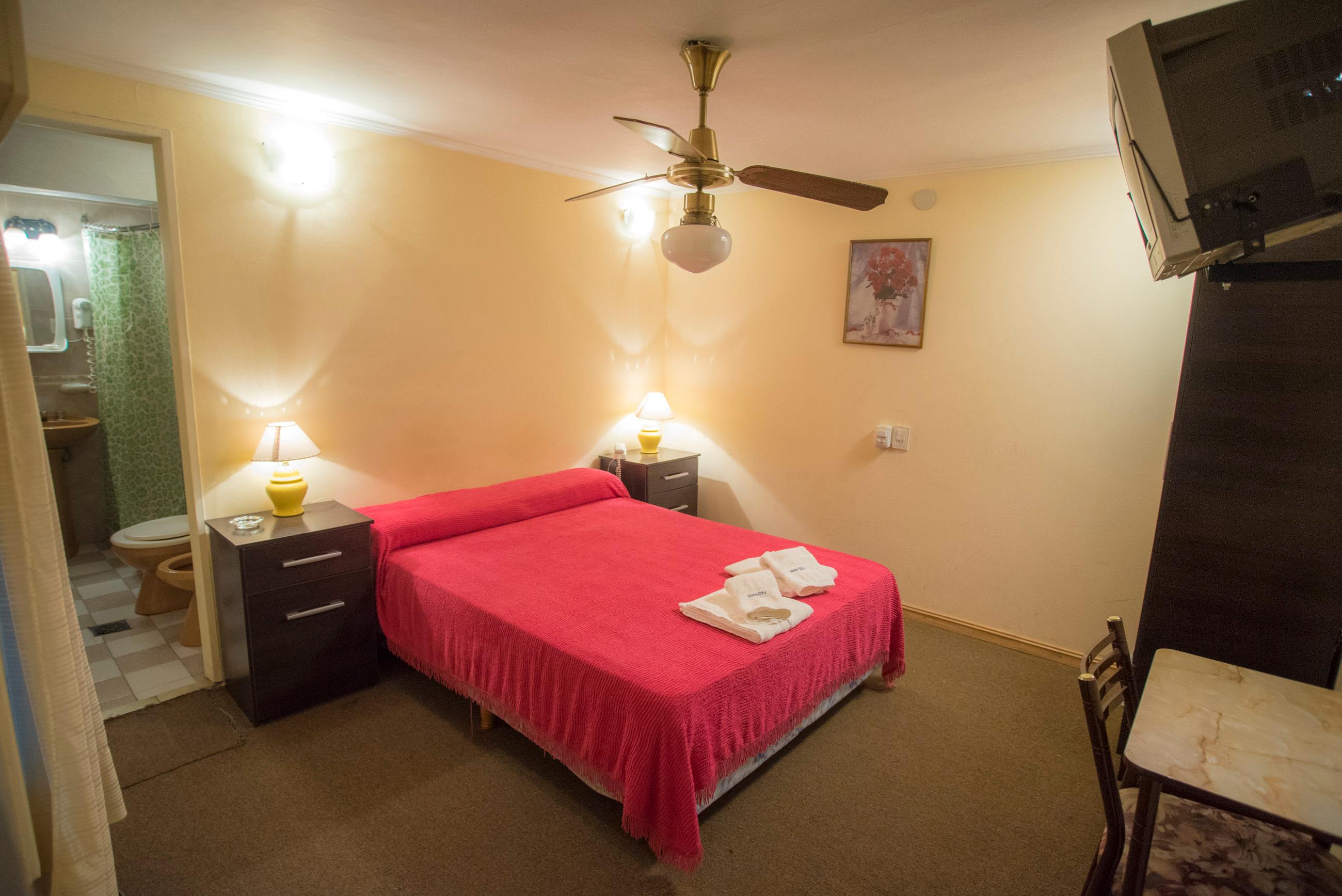 Habitación Nuevo City Hotel